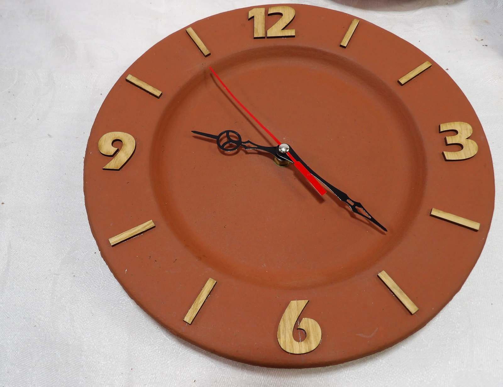 Handmade Clock: 11" Sri Lankan Handmade Clock. All measurements approximate. Please see photos for condition and details. Selling as is from 04281.