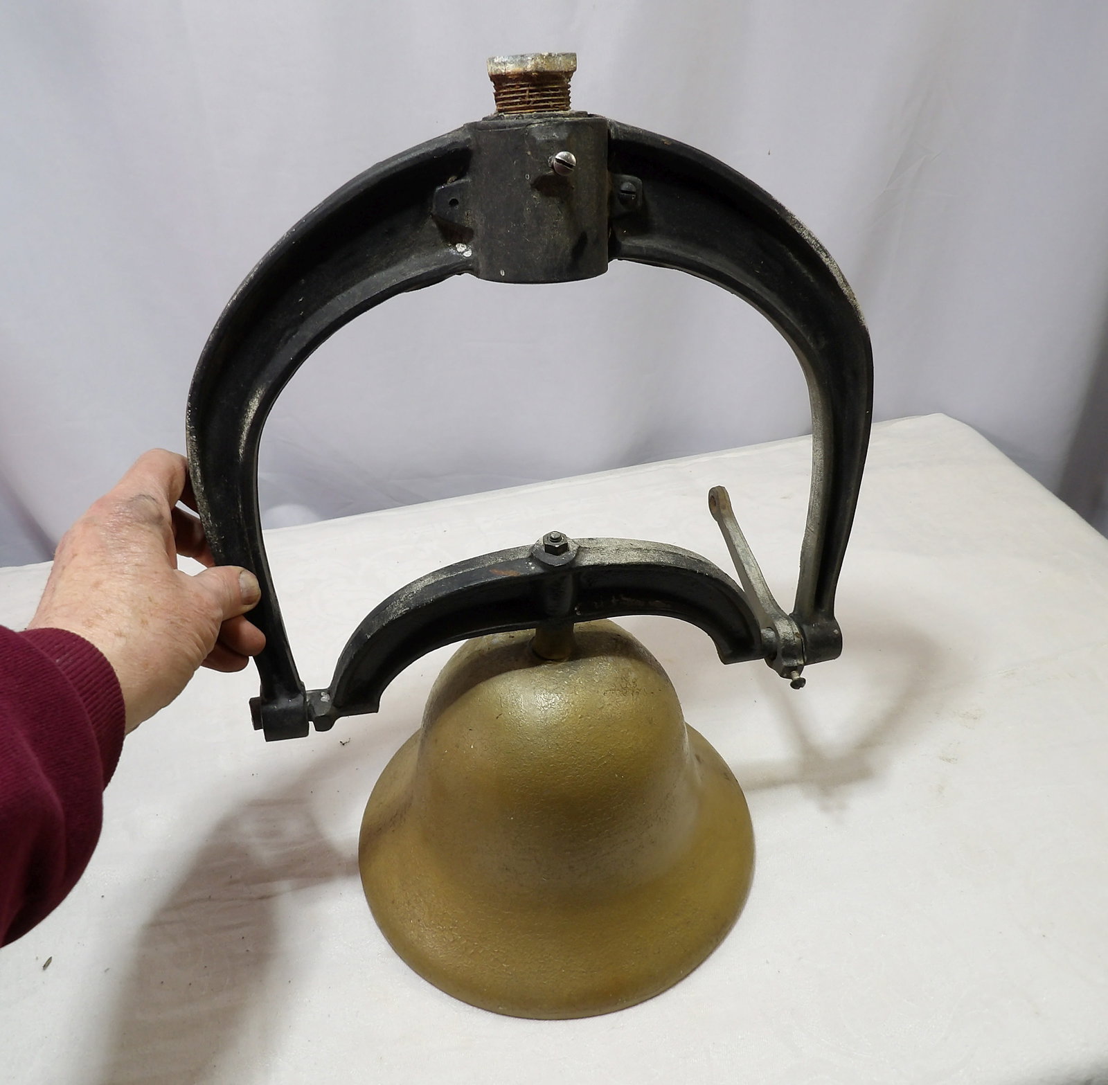 Antique Dinner Bell: Antique Farm/School Dinner Bell with Yoke. Bell is 9" Diameter. All measurements approximate. Please see photos for condition and details. Selling as is from 04281.