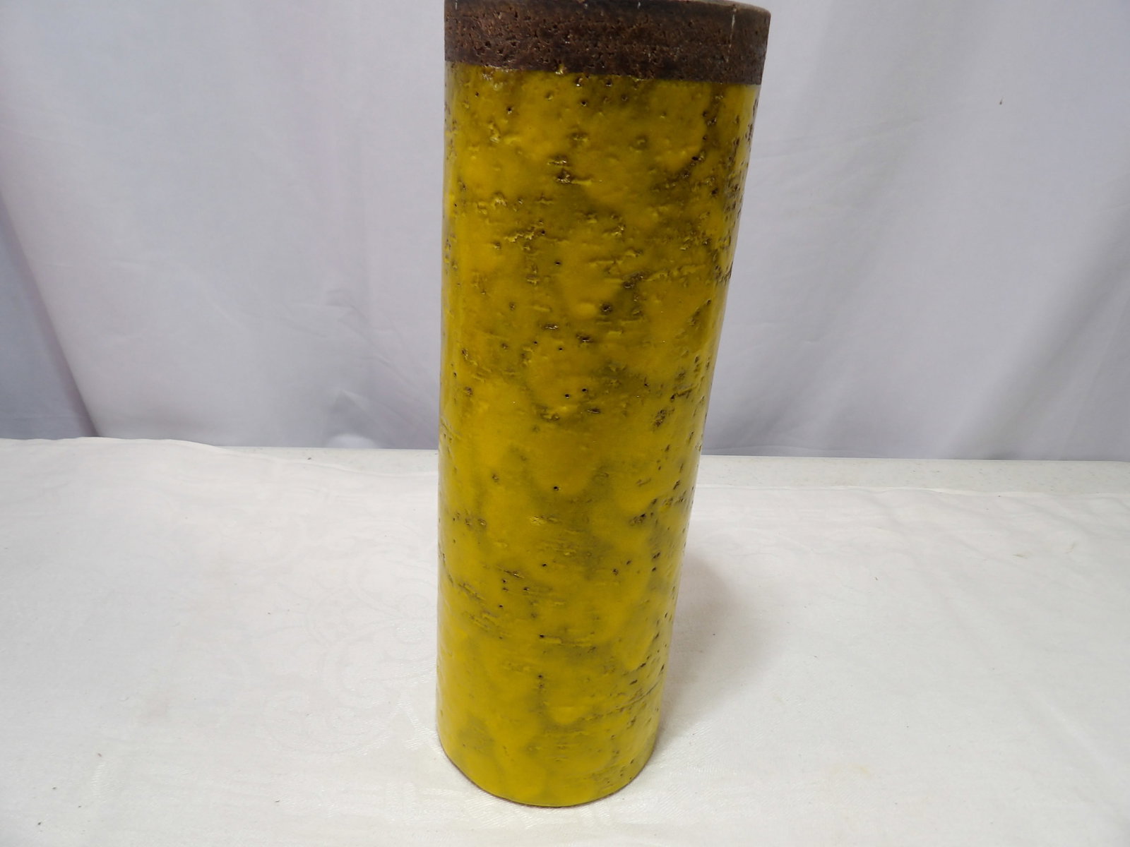 Ceramic Vase: 11 1/2" Raymor Cylindrical Ceramic Vase. All measurements approximate. Please see photos for condition and details. Selling as is from 04281.