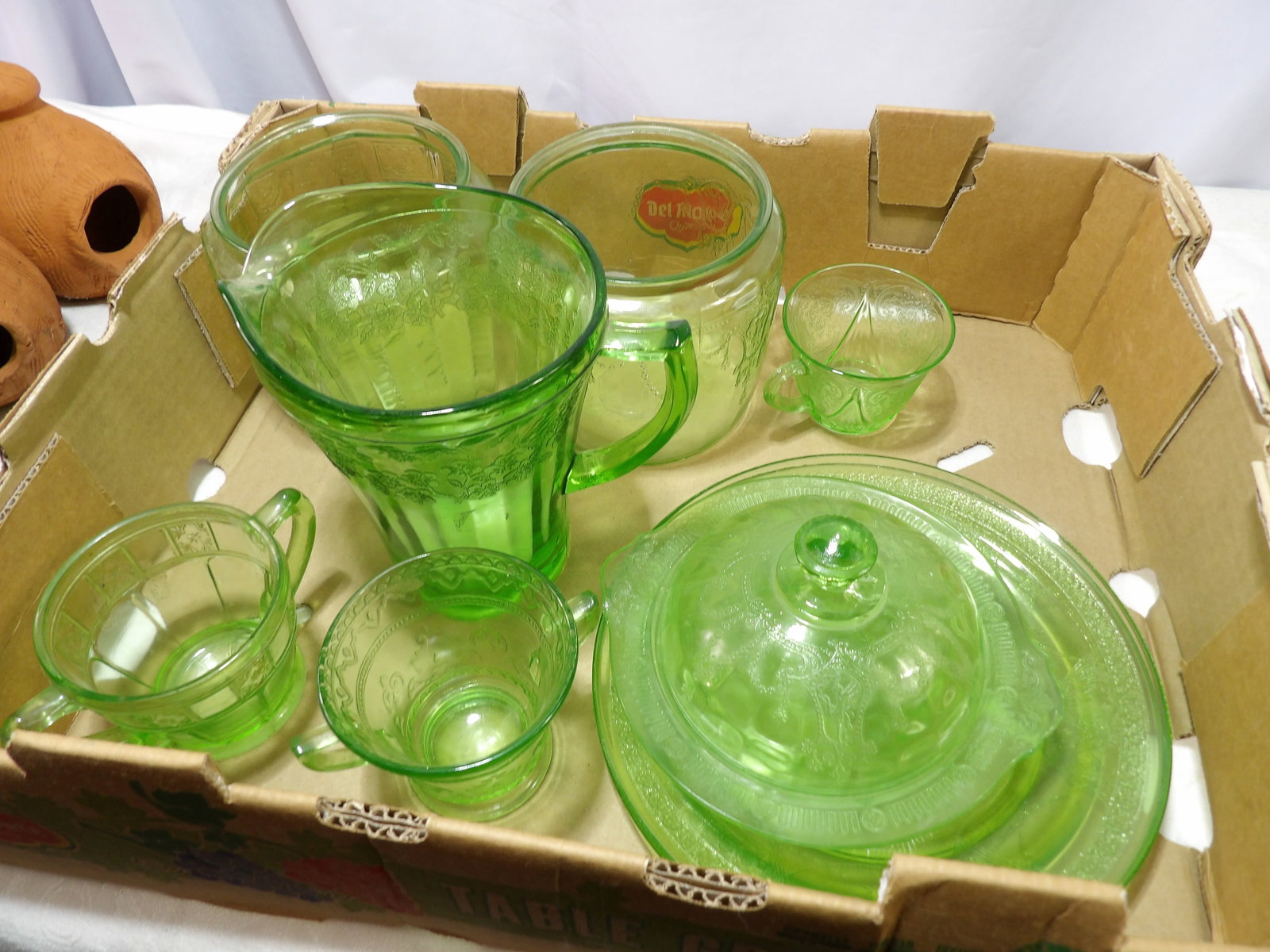 9 PCS- Assortment of Vintage Depression Glass Items: Assortment of Vintage Green Uranium Depression Glass. 9 Pieces. All measurements approximate. Please see photos for condition and details. Selling as is from 04281.