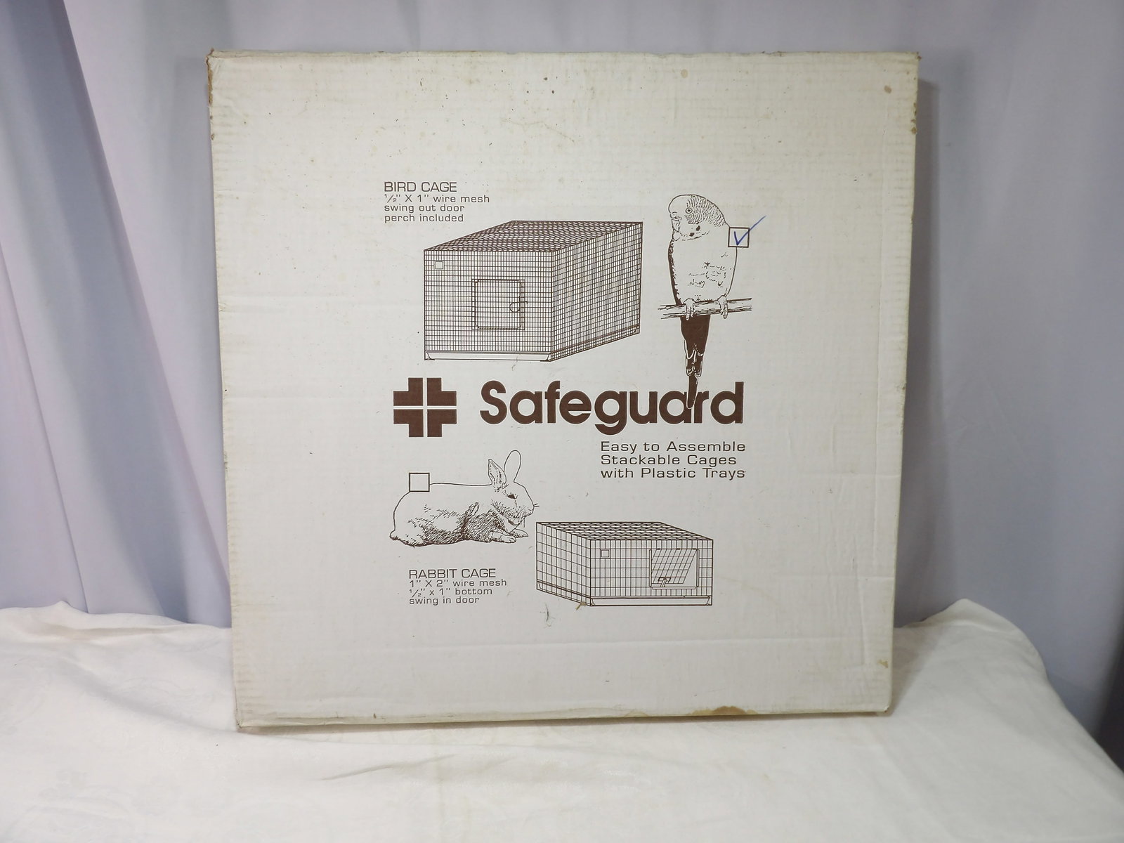 Pet Cage: New Safeguard Pet Cage, 24" X 24" X 20". All measurements approximate. Please see photos for condition and details. Selling as is from 04281.