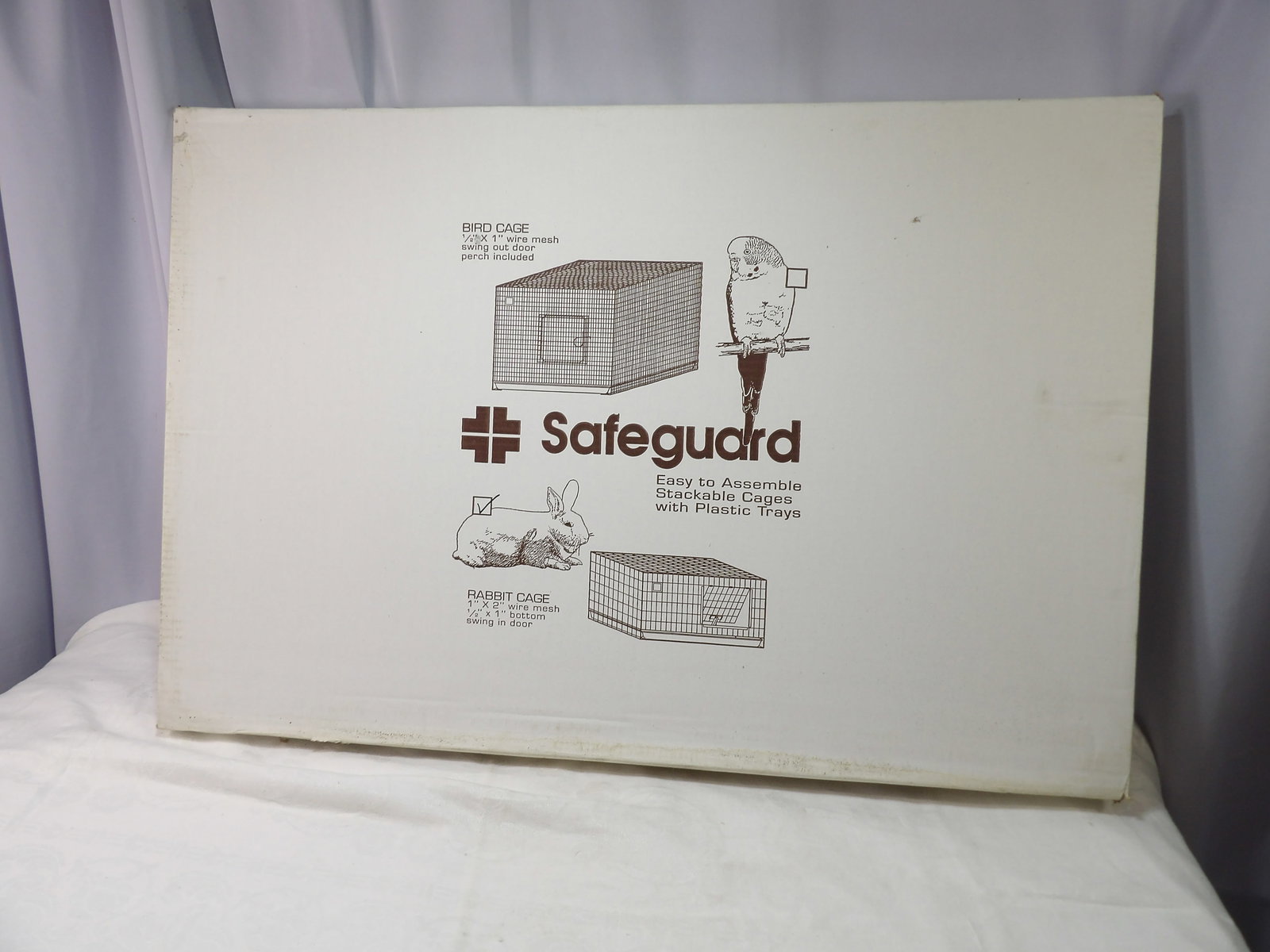 Pet Cage: New Safeguard Pet Cage, 36" X 24" X 14". All measurements approximate. Please see photos for condition and details. Selling as is from 04281.