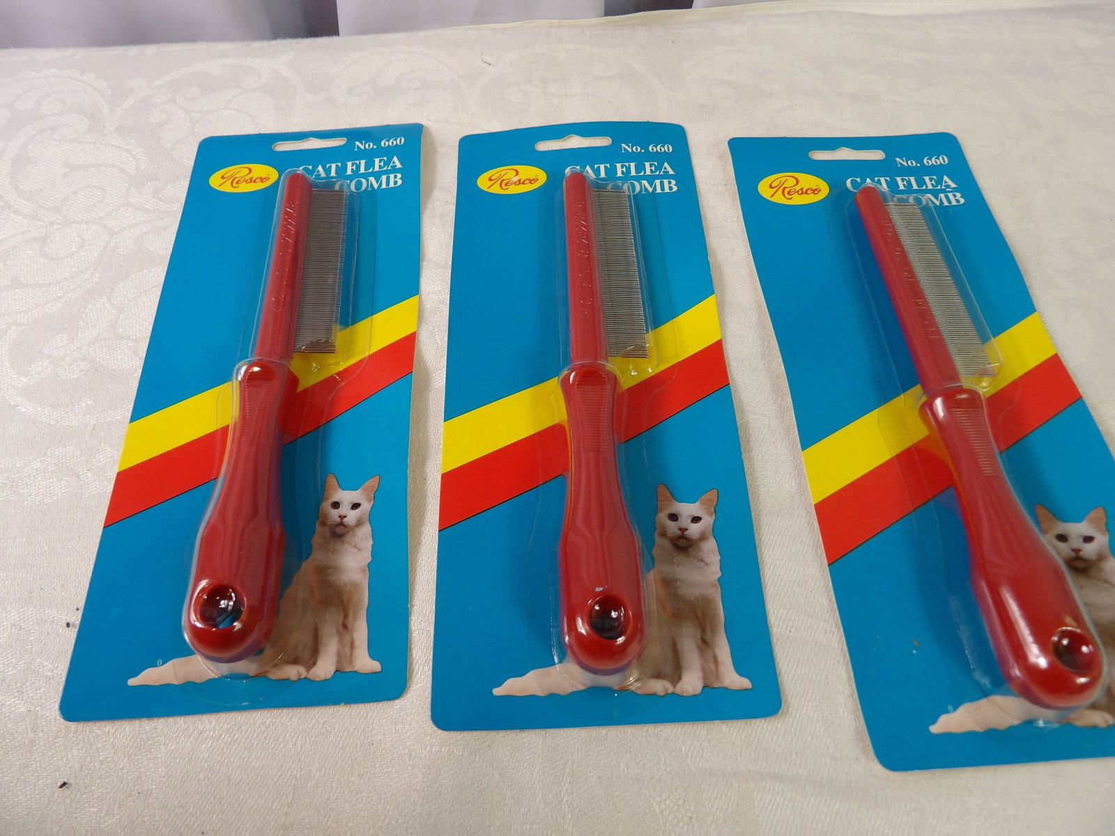 12 PCS.-Cat Flea Combs: Box of 12 New Resco #660 Cat Flea Combs. All measurements approximate. Please see photos for condition and details. Selling as is from 04281.