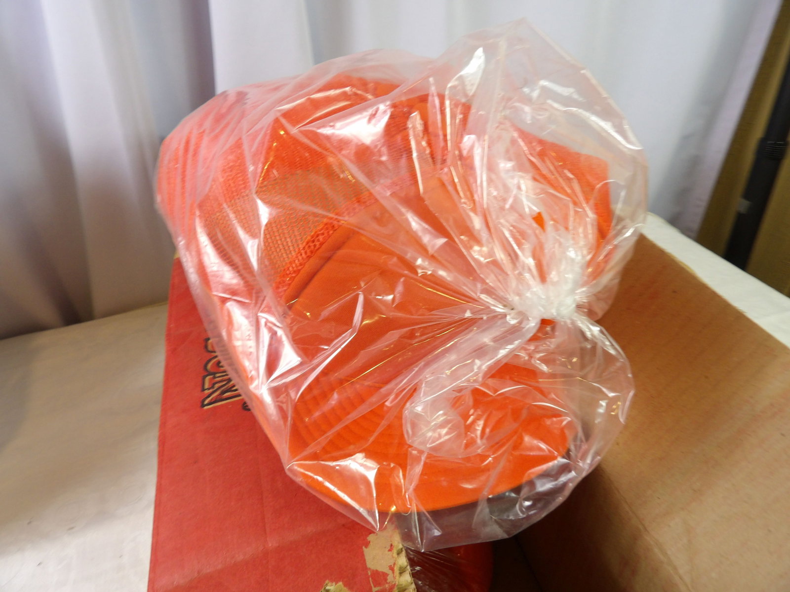 24 PCS.-Blaze Orange Caps: Box of 24 New Blaze Orange Caps. All measurements approximate. Please see photos for condition and details. Selling as is from 04281.
