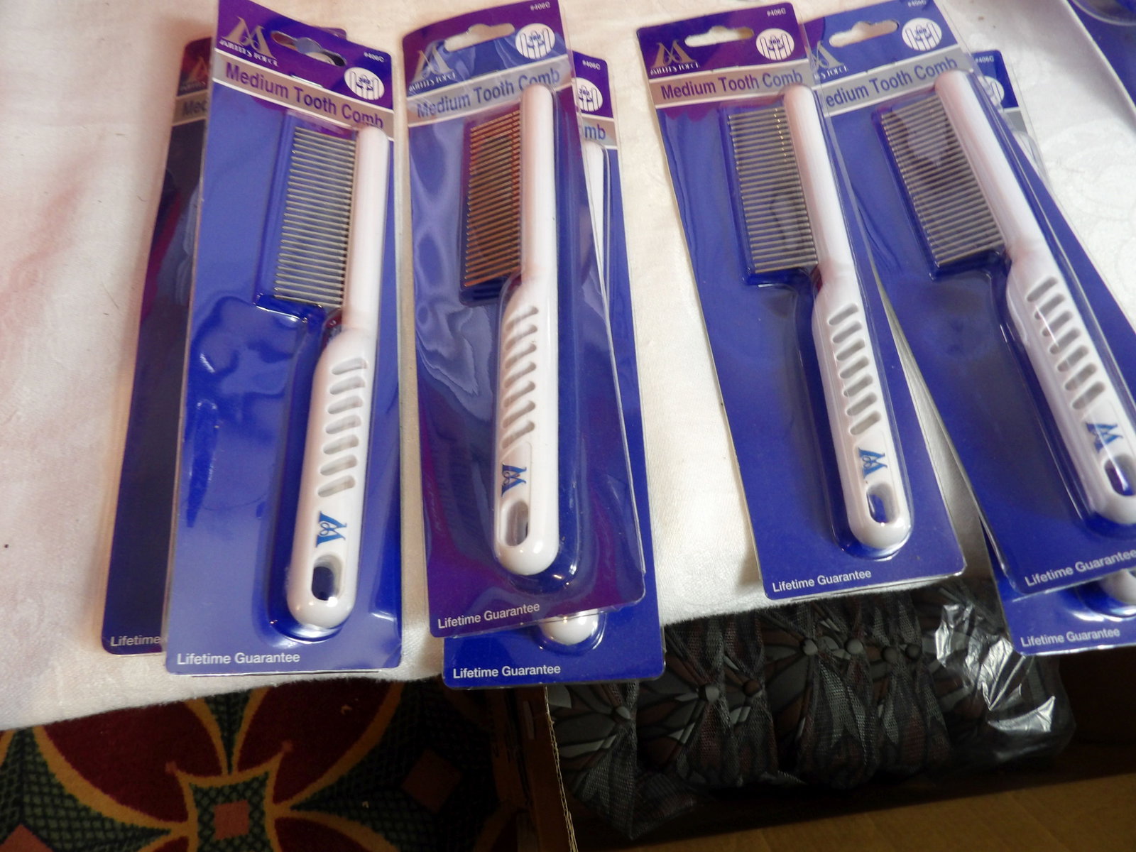 Set of 7 Medium Tooth Pet Combs: Set of 7 New Medium Tooth Pet Combs. All measurements approximate. Please see photos for condition and details. Selling as is from 04281.