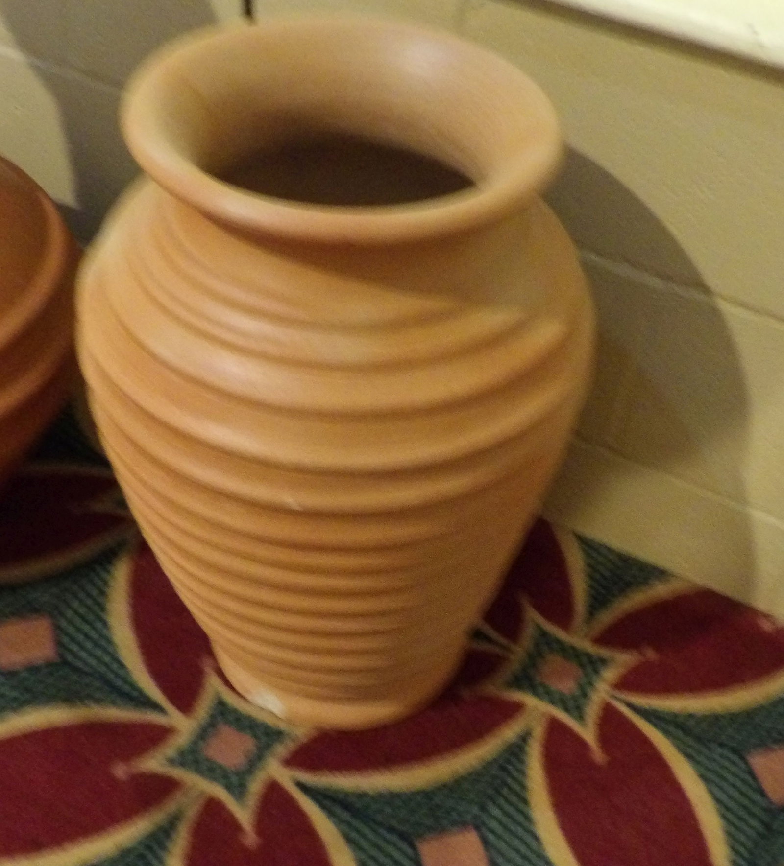20" Handmade Pottery Vase: Sri Lankan Handmade Pottery Vase, 20" Tall. (Has one small chip on base.) All measurements approximate. Please see photos for condition and details. Selling as is from 04281.