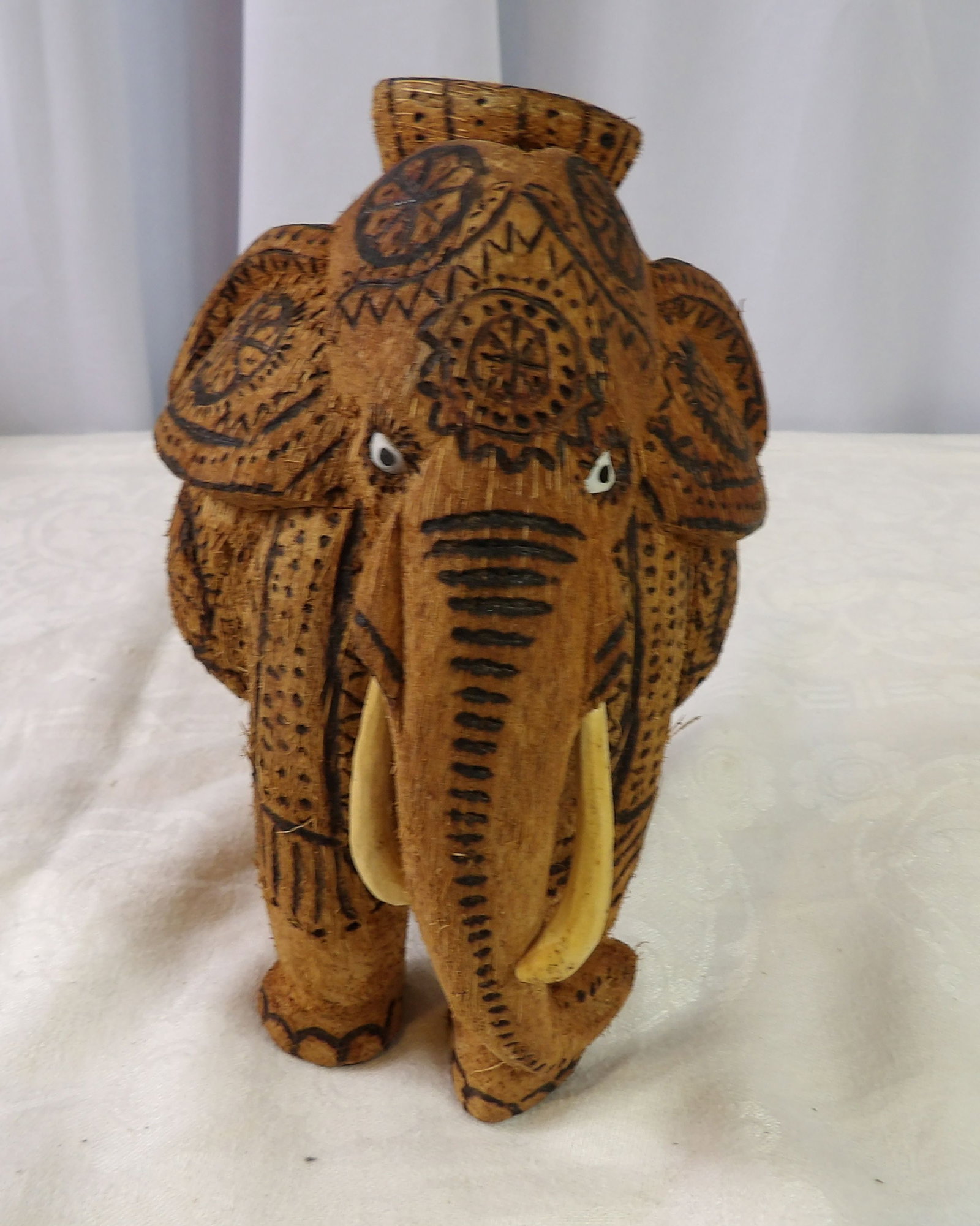 Hand Carved Coconut Elephant: Sri Lankan Hand Carved Coconut Shell, Elephant Figure. All measurements approximate. Please see photos for condition and details. Selling as is from 04281.