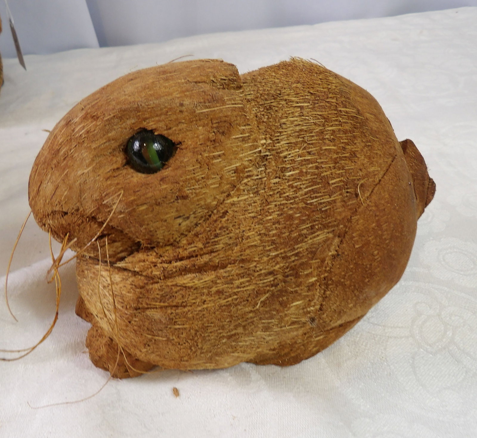 Hand Carved Coconut Rabbit: Sri Lankan Hand Carved Coconut Shell, Rabbit Figure. All measurements approximate. Please see photos for condition and details. Selling as is from 04281.