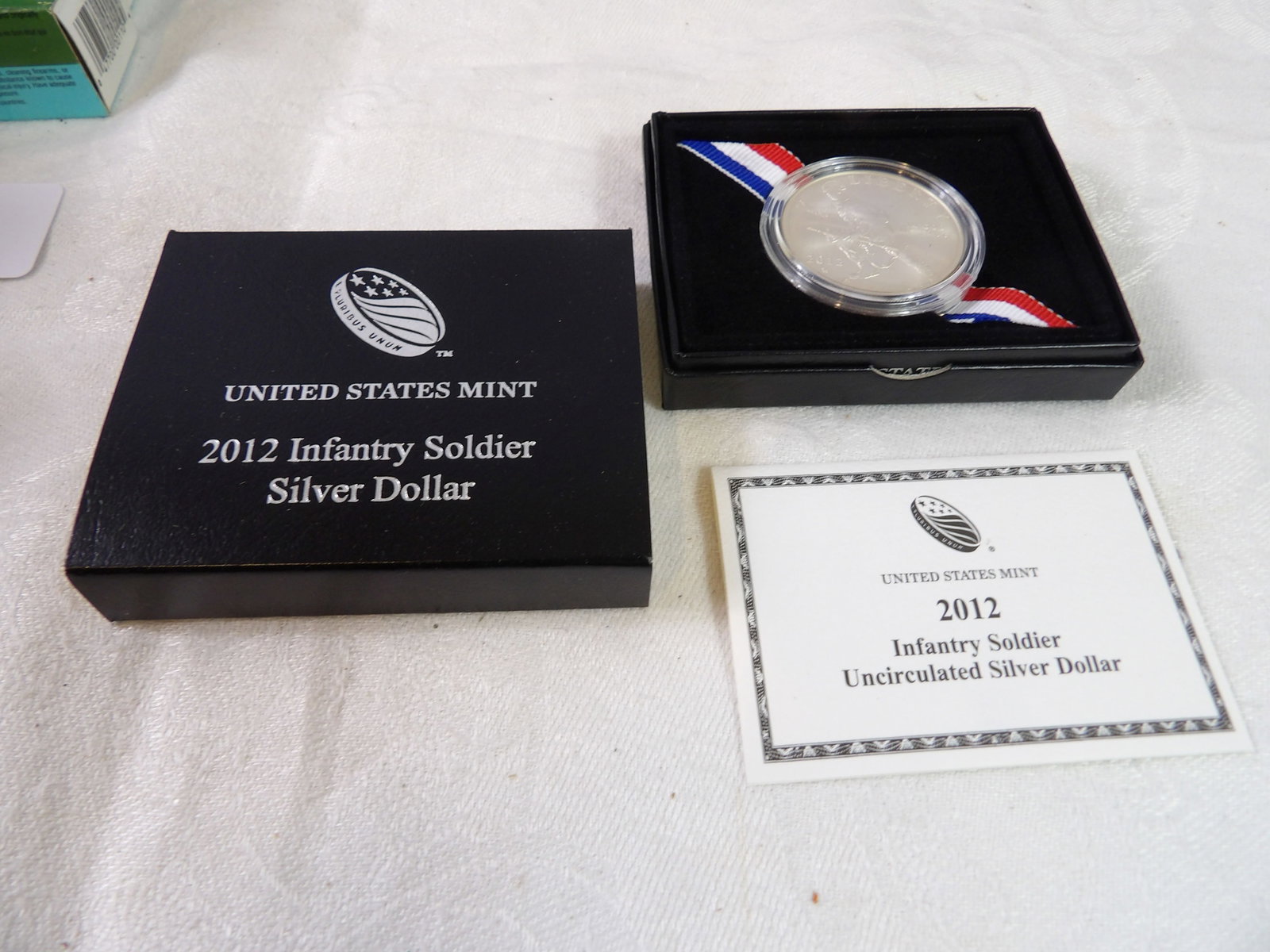 2012 U.S. Mint Infantry Soldier Silver Dollar: 2012 United States Mint Infantry Soldier Silver Dollar. 1 Oz. All measurements approximate. Please see photos for condition and details. Selling as is from 04281.