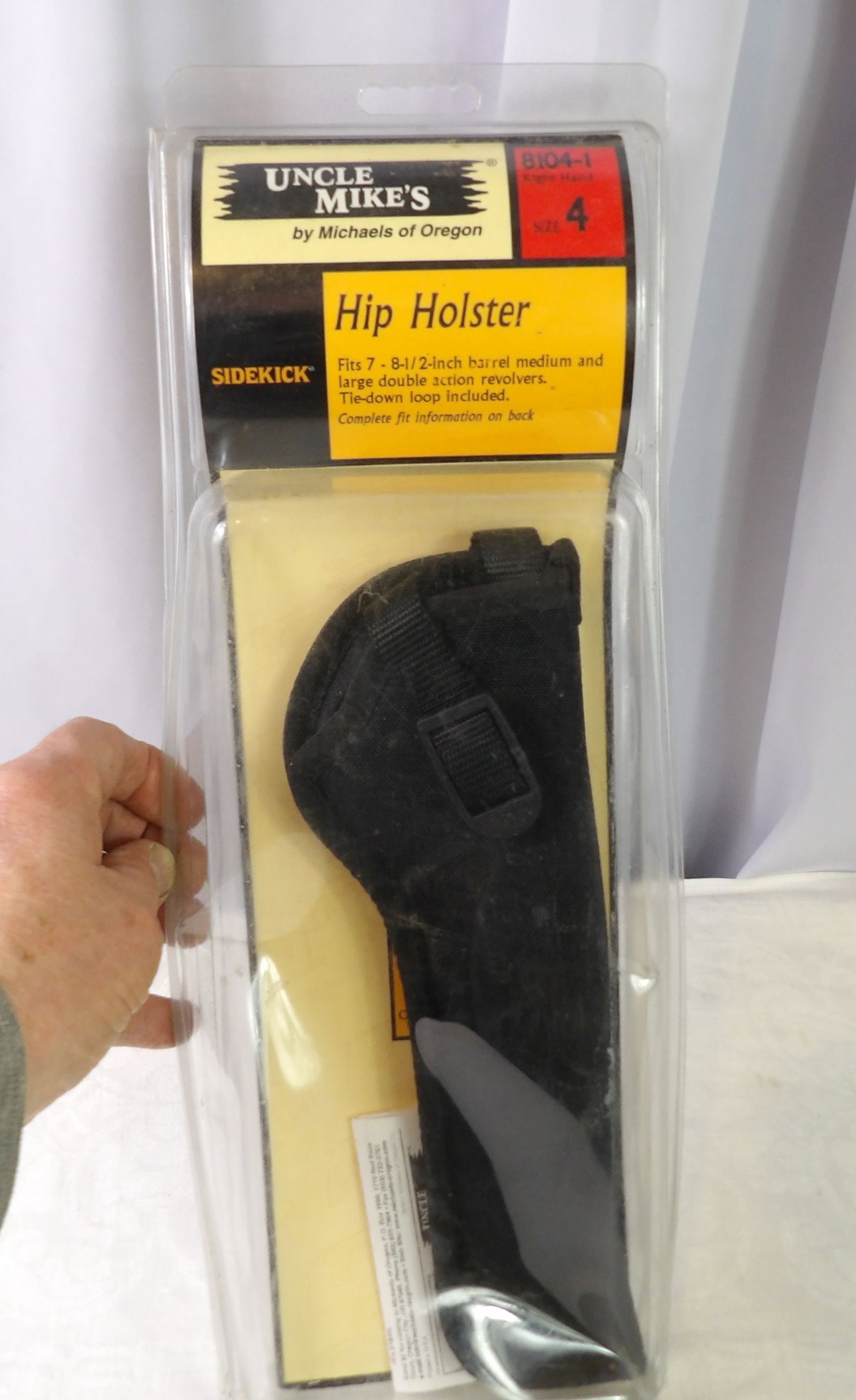 Sidekick Right Handed Hip Holster: Uncle Mike's Sidekick Hip Holster, Size 4, Right Hand, Fits 7" -8 1/2" Revolvers. All measurements approximate. Please see photos for condition and details. Selling as is from 04281.