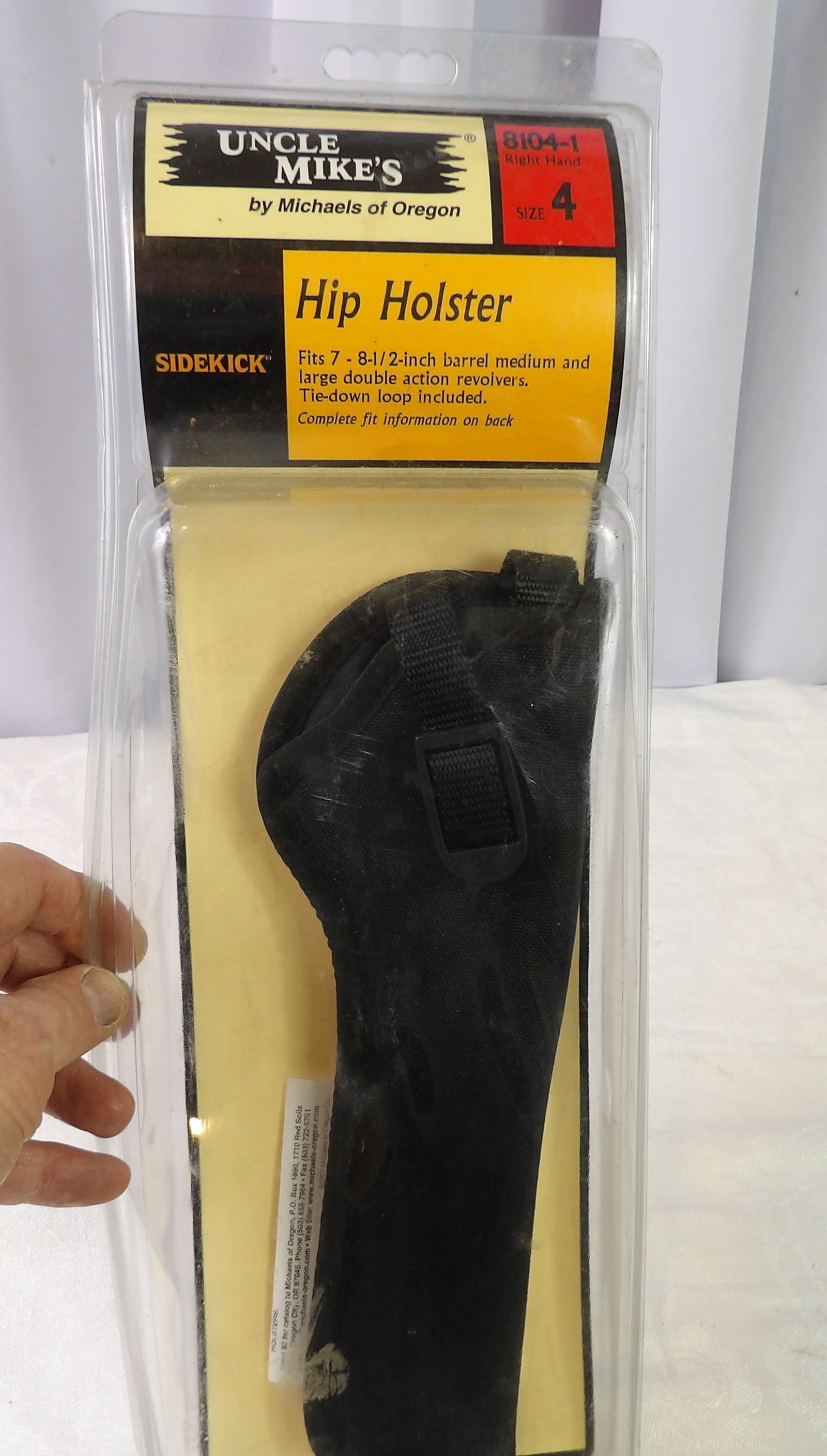 Right Handed Hip Holster: Uncle Mike's Sidekick Hip Holster, Size 4, Right Hand, Fits 7" -8 1/2" Revolvers. All measurements approximate. Please see photos for condition and details. Selling as is from 04281.