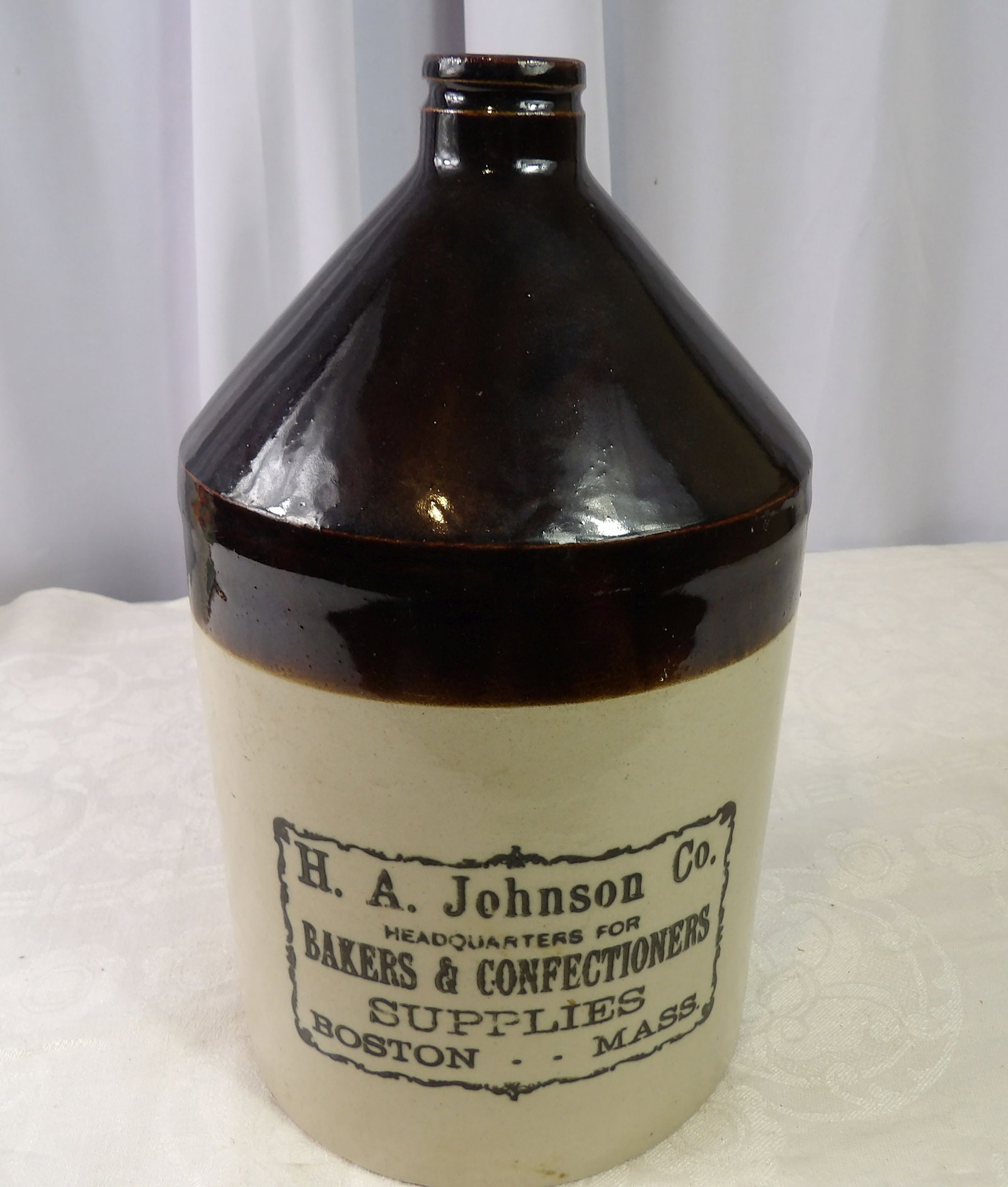 Early H.A. Johnson Stoneware Jug: Early H.A. Johnson Co. Stoneware Jug, Perfect Condition, 12" Tall. All measurements approximate. Please see photos for condition and details. Selling as is from 04281.