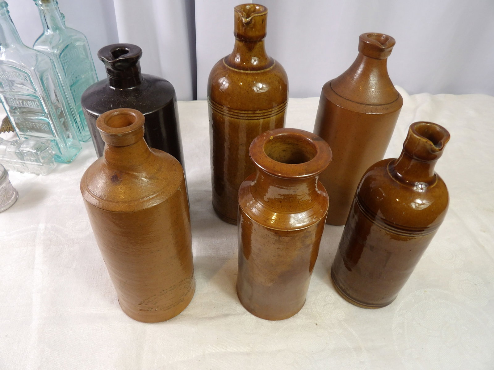 6 PCS.- Glazed Stoneware Ink Bottles: Set of 6 Antique Glazed Stoneware Ink Bottles. All measurements approximate. Please see photos for condition and details. Selling as is from 04281.