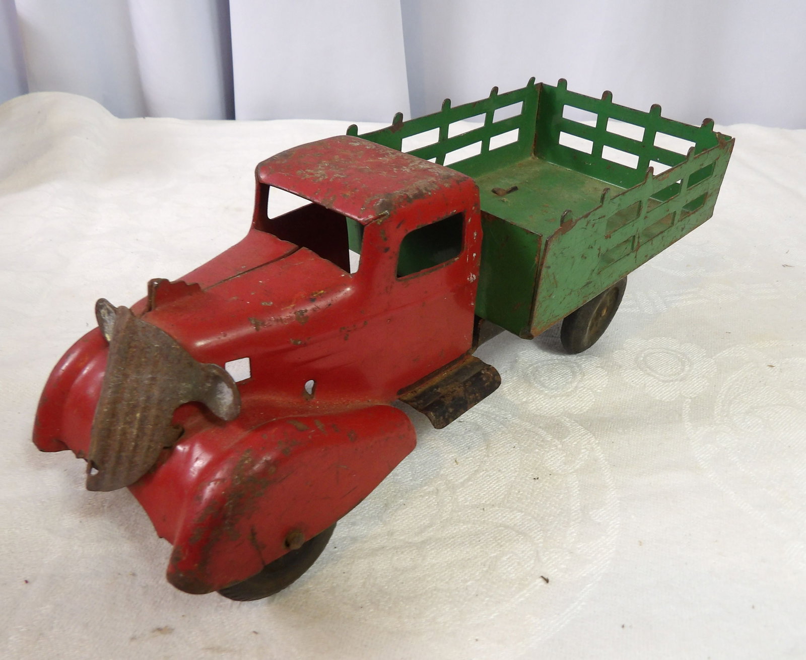 Pressed Steel Tin Truck: Vintage Pressed Steel Tin Truck. All measurements approximate. Please see photos for condition and details. Selling as is from 04281.