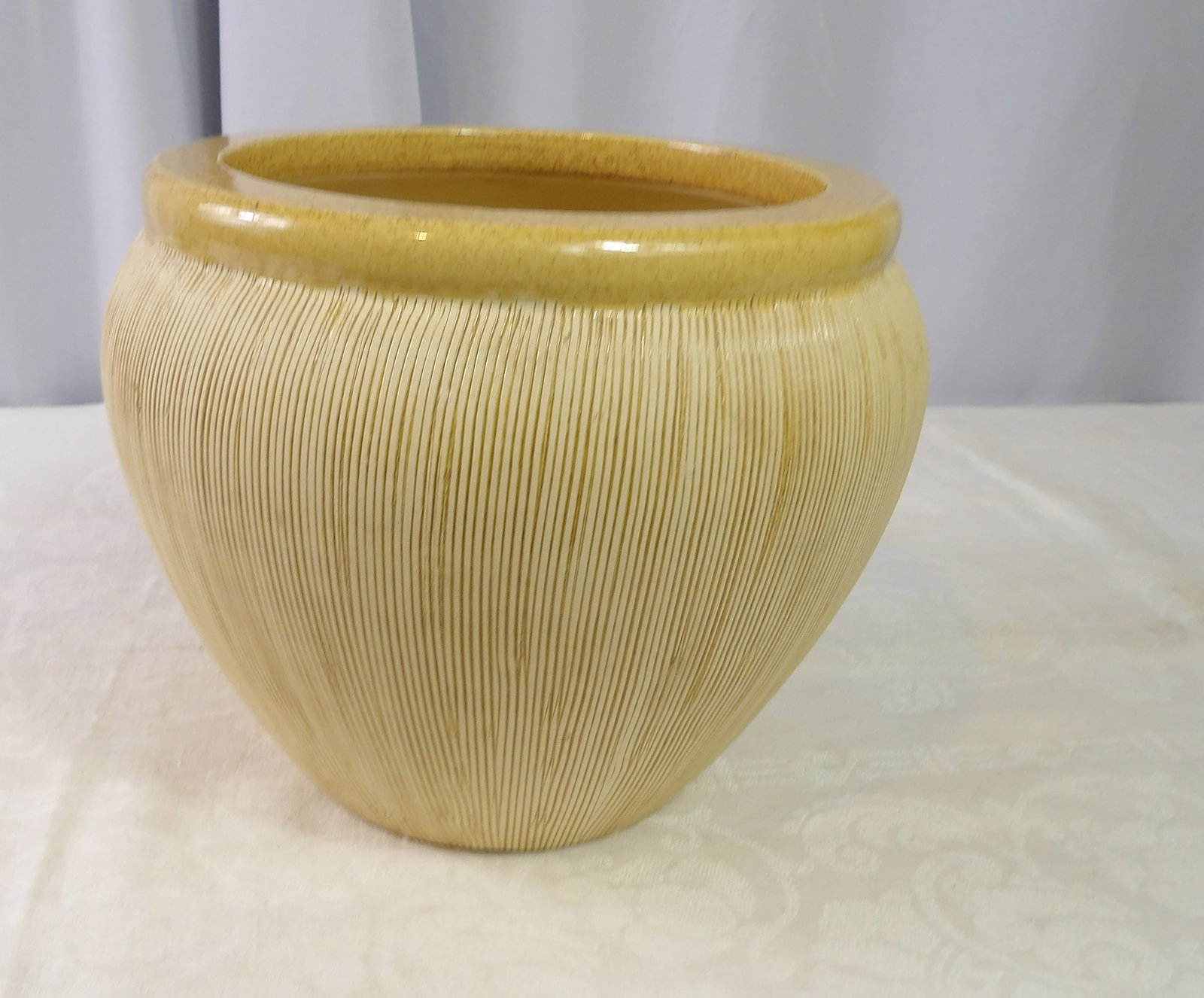 Stoneware Planter: Vintage Ribbed Stoneware Planter. 8" Diameter. All measurements approximate. Please see photos for condition and details. Selling as is from 04281.