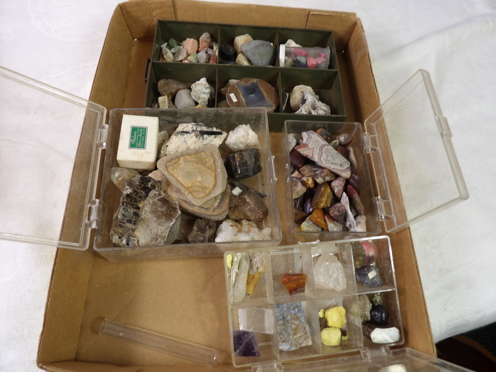 Assortment of Rocks and Minerals: Large Assortment of Rocks and Minerals. All measurements approximate. Please see photos for condition and details. Selling as is from 04281.