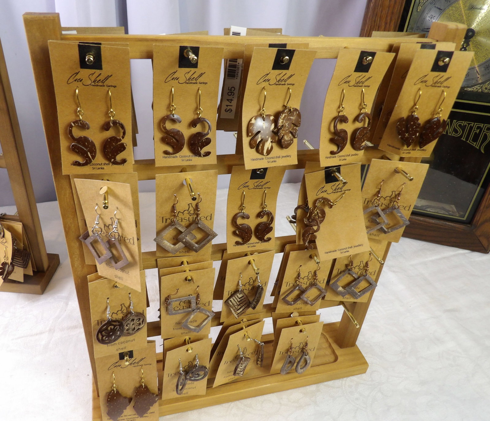 Earring Display with Contents: Nice Earring Display with Contents. All measurements approximate. Please see photos for condition and details. Selling as is from 04281.