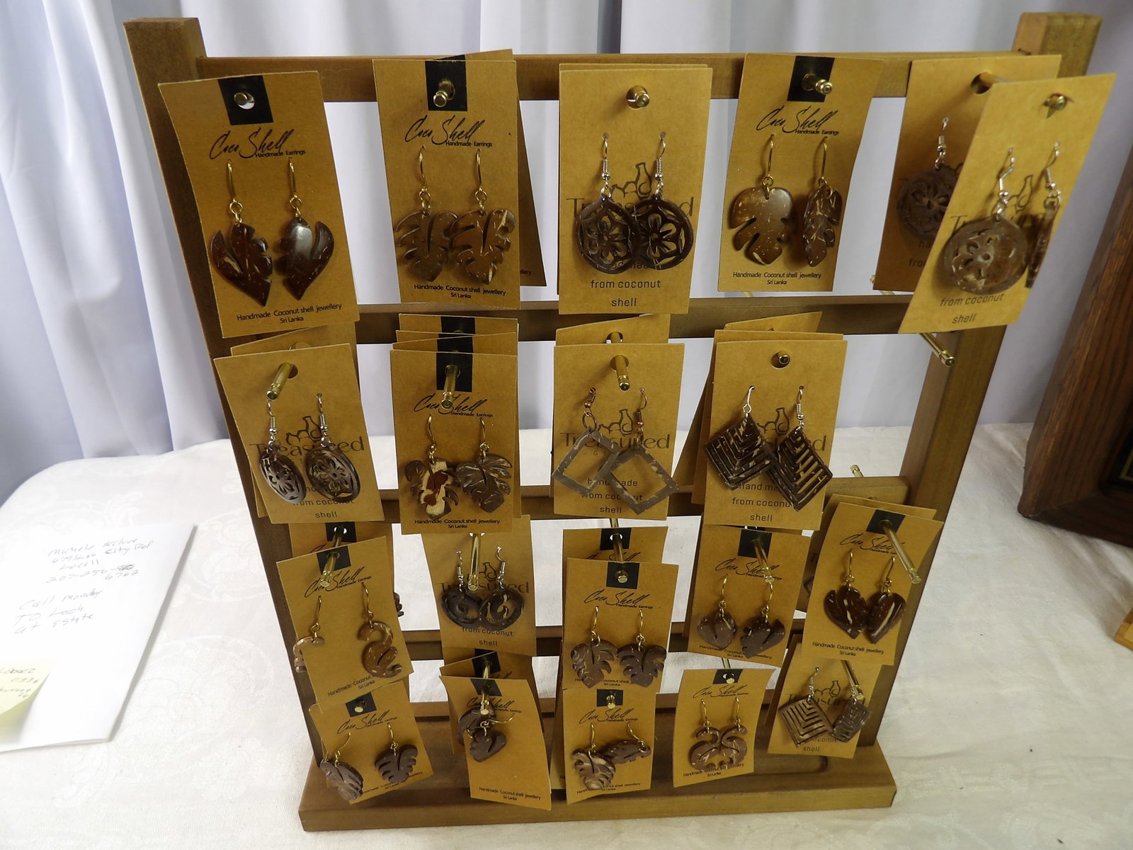 Earring Display with Contents: Earring Display with Contents. All measurements approximate. Please see photos for condition and details. Selling as is from 04281.