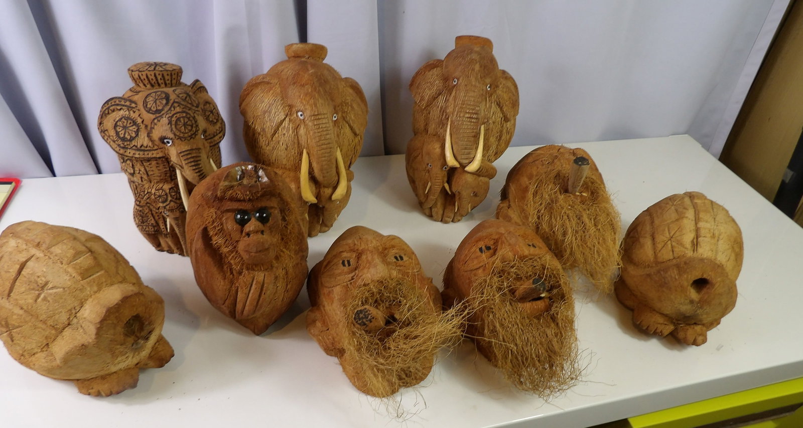 Assorted Coconut Figures: Assortment of Sri Lankan Hand Carved Coconut Figures. All measurements approximate. Please see photos for condition and details. Selling as is from 04281.