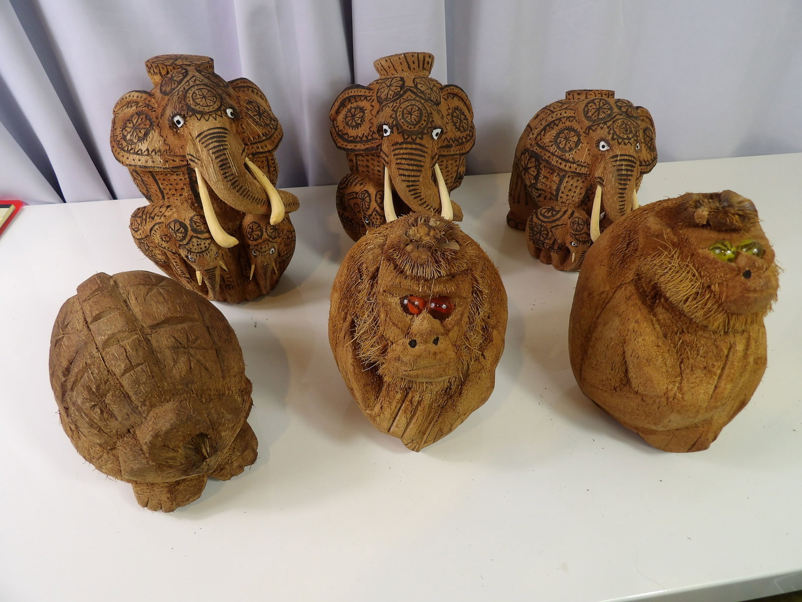 6 PCS.-Coconut Figures: Assortment of 6 Sri Lankan Hand Carved Coconut Figures. All measurements approximate. Please see photos for condition and details. Selling as is from 04281.