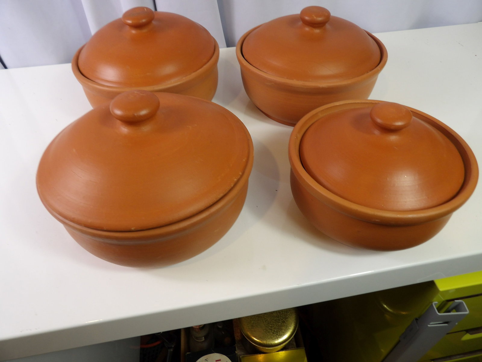 4 PCS.-Earthenware Cooking Pots and Lids: Set of 4 Sri Lankan Handmade Earthenware Cooking Pots and Lids. All measurements approximate. Please see photos for condition and details. Selling as is from 04281.