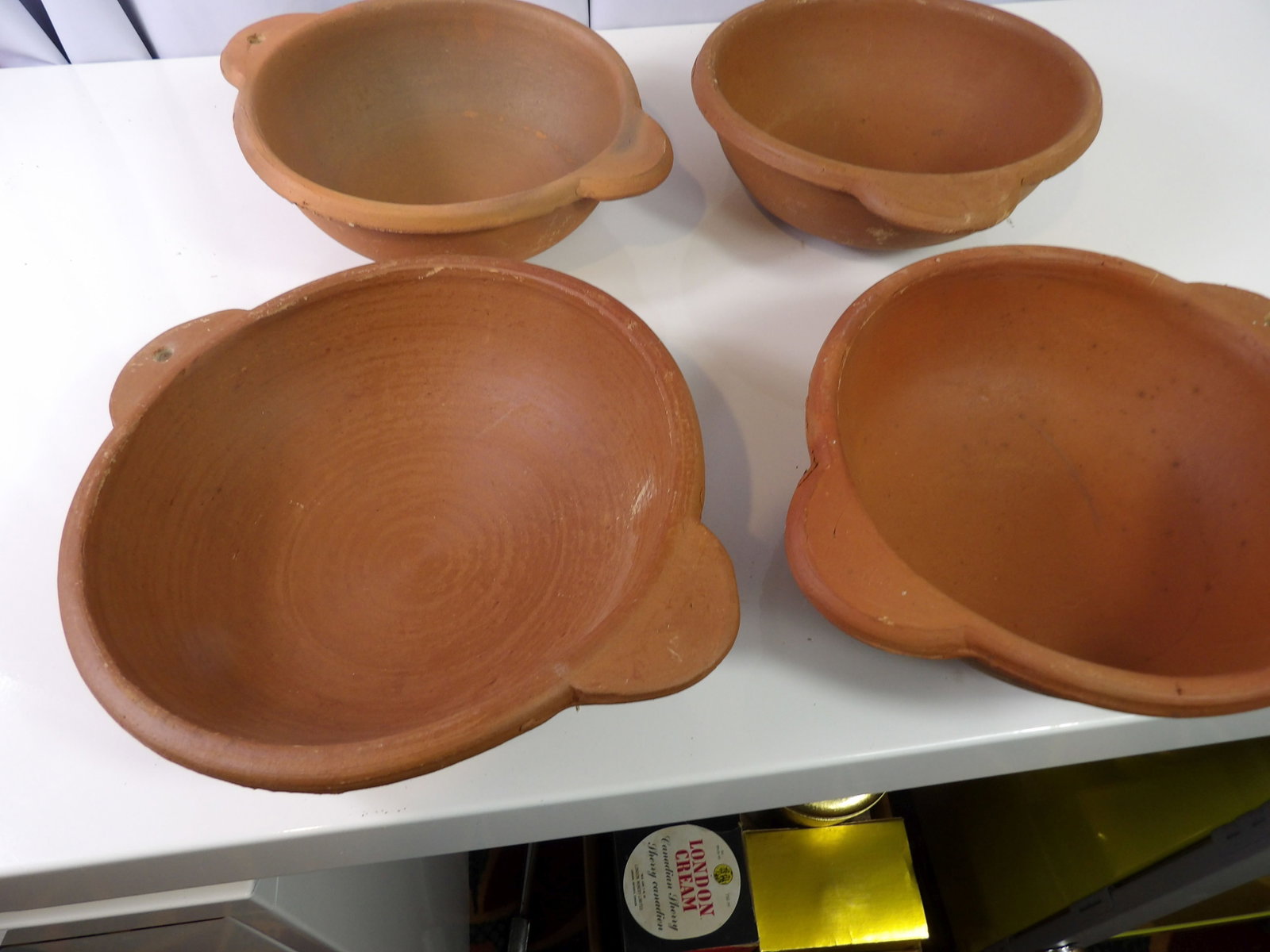 4 PCS.- Handmade Pottery Bowls: Set of 4 Sri Lankan Handmade Pottery Bowls. All measurements approximate. Please see photos for condition and details. Selling as is from 04281.