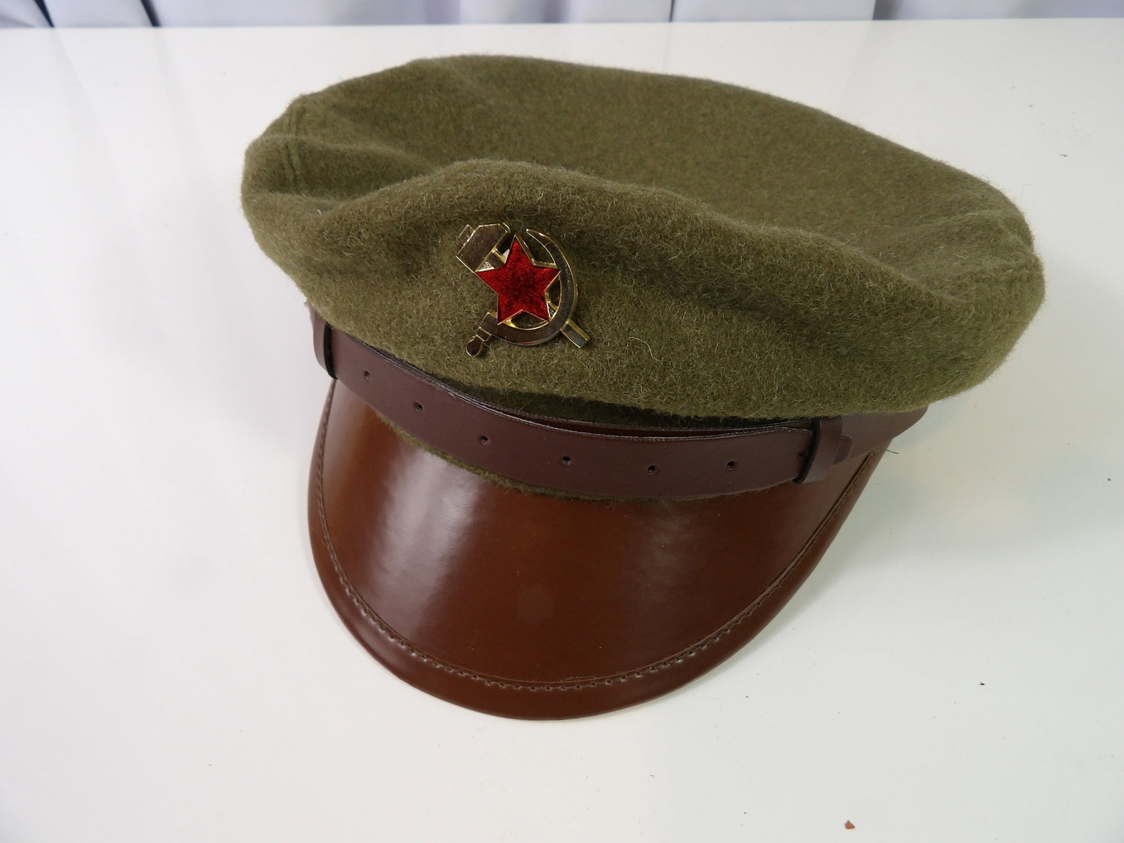 Soviet RKKA Military Visor Cap: Soviet RKKA Military Visor Cap. Like New. Made by Sterkowski. All measurements approximate. Please see photos for condition and details. Selling as is from 04281.
