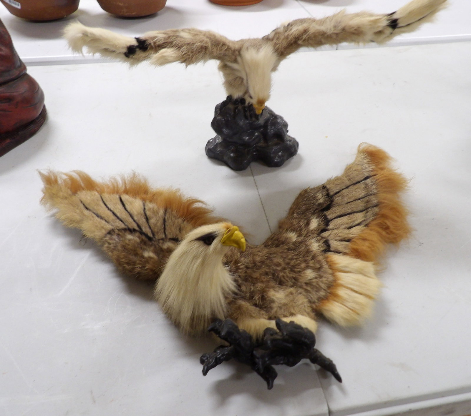 Pair Of Eagle Wall Hangers: Nice Pair of Eagle Wall Hangers. All measurements approximate. Please see photos for condition and details. Selling as is from 04281.
