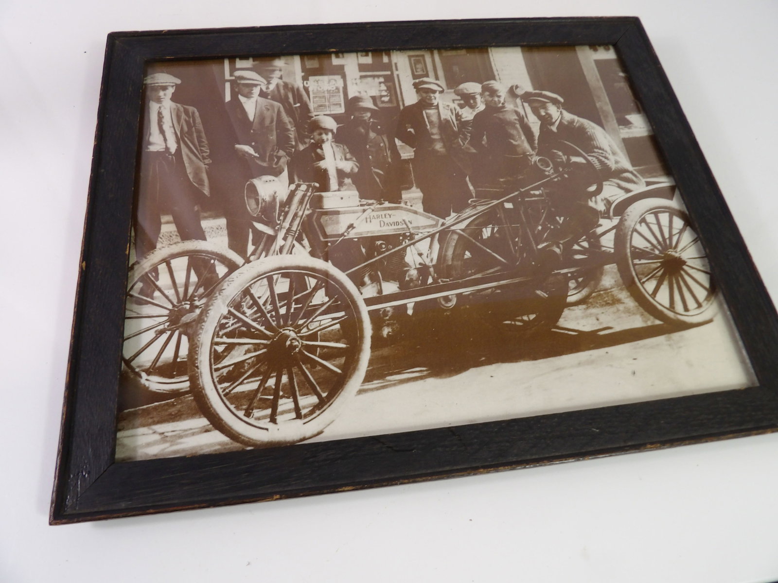 Harley Davidson Photo: Vintage Harley Davidson Photo in Frame, 13" x 16". All measurements approximate. Please see photos for condition and details. Selling as is from 04281.
