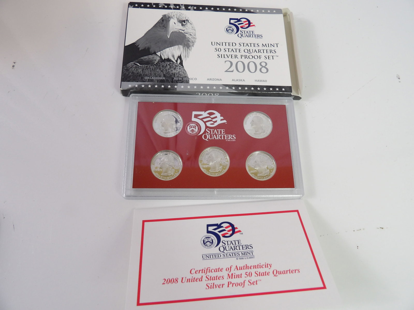 2008 United States Mint 50 State Quarters Silver Proof Set: 2008 United States Mint, 50 State Quarters Silver Proof Set, 90% Silver with COA. All measurements approximate. Please see photos for condition and details. Selling as is from 04281.