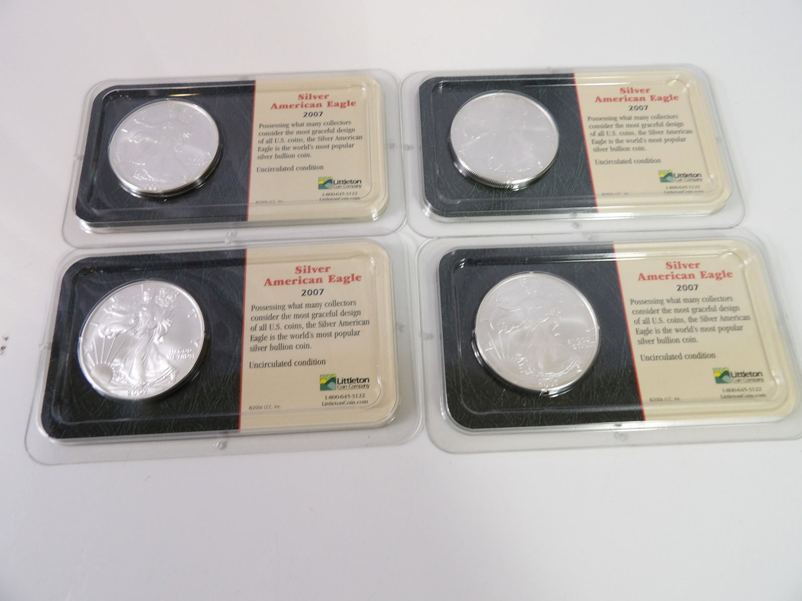 4 2007 American Eagle Silver Bullion, Uncirculated: 4- 2007 Silver American Eagle Bullion. All Uncirculated Condition. All measurements approximate. Please see photos for condition and details. Selling as is from 04281.