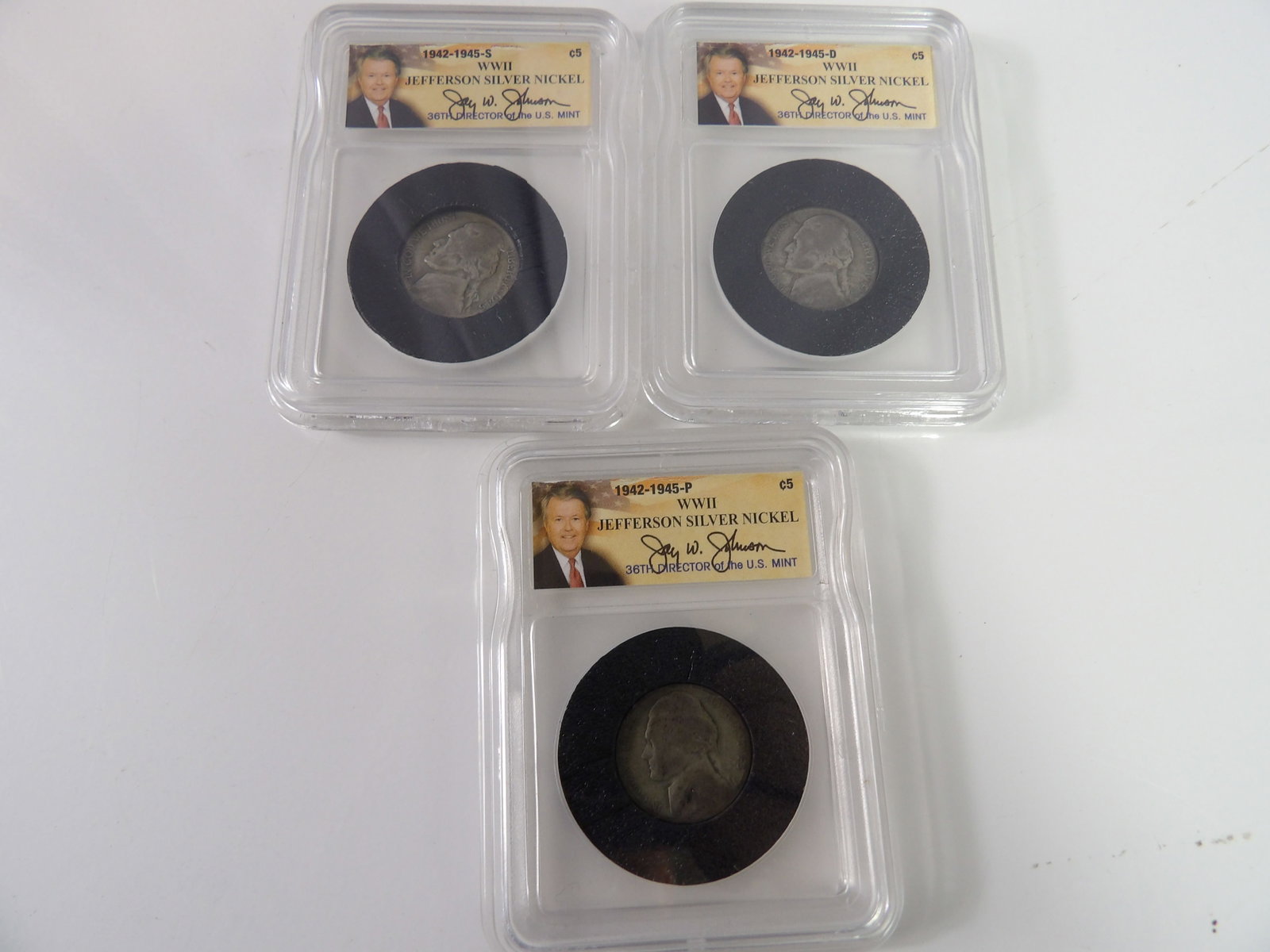 1943P, 1944D, & 1945S Jefferson Nickels: 3 WWII Jefferson Silver Nickels. Dated 1943P, 1944D and 1945S. All measurements approximate. Please see photos for condition and details. Selling as is from 04281.