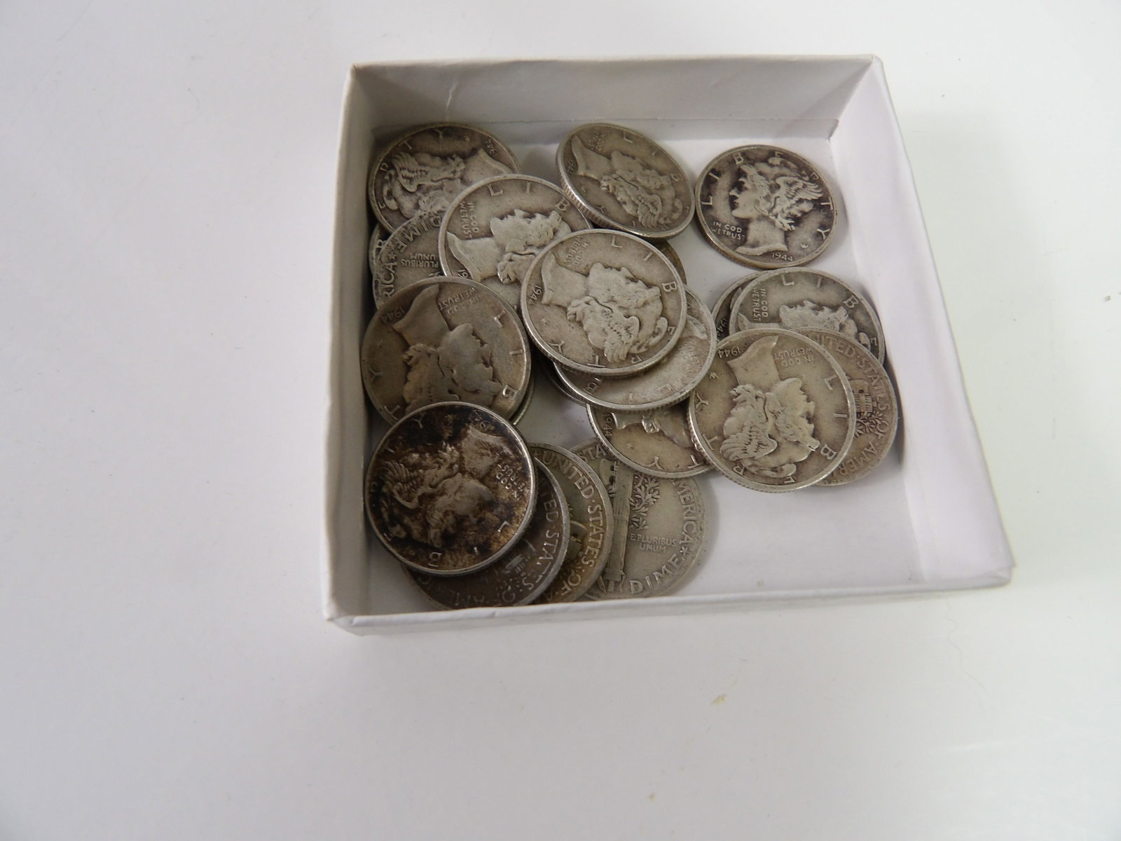 Collection of 24 Mercury Dimes, Assorted Dates: Collection of 24 Mercury Dimes. Assorted Dates, Assorted Conditions. All measurements approximate. Please see photos for condition and details. Selling as is from 04281.