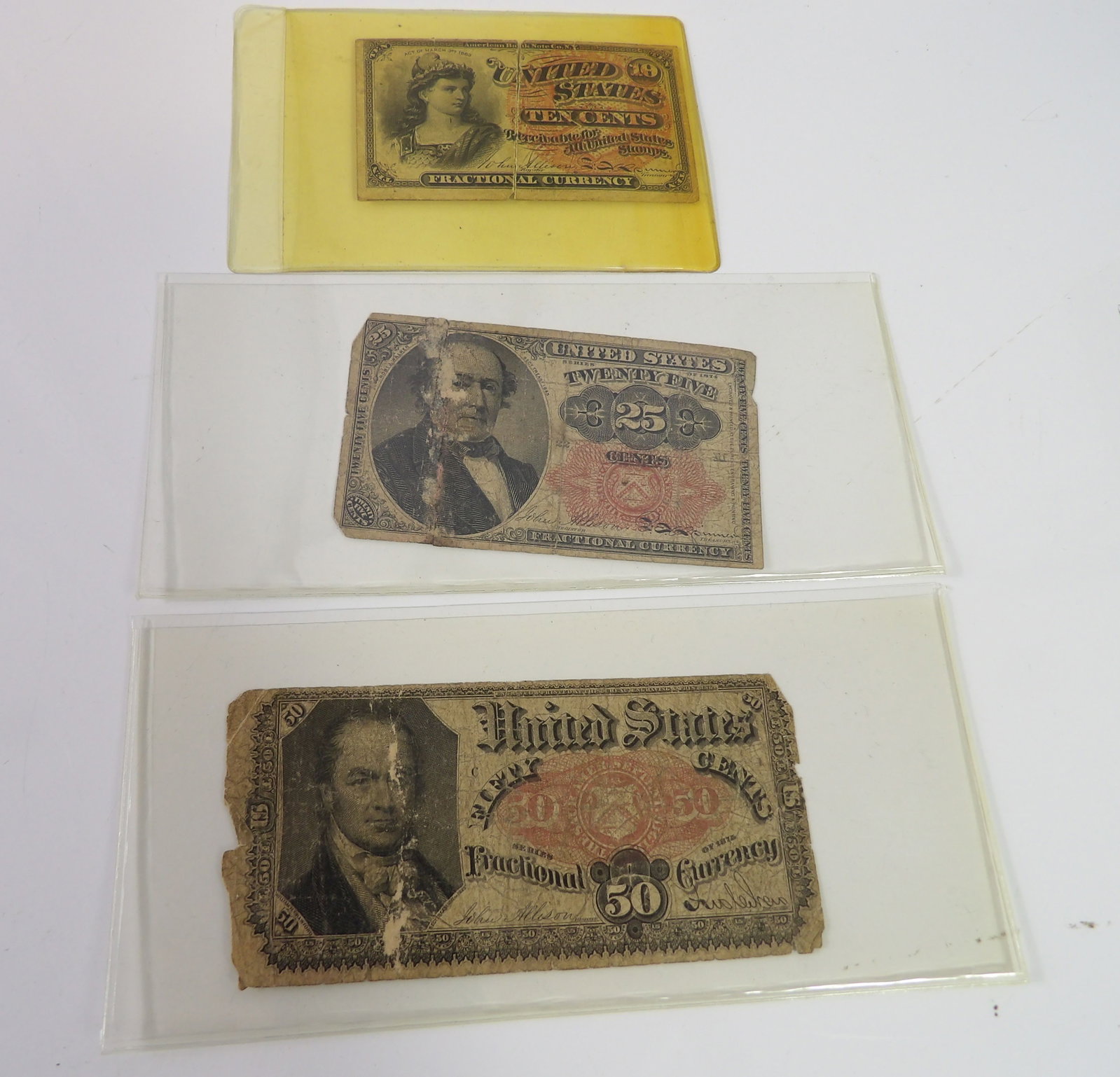 Fractional U.S. Currency, 1863 10 Cents, 1874 25 Cents, 1875 50 Cents: 3 Fractional U.S. Currency, 10 cents, 25 cents, and 50 cents. All measurements approximate. Please see photos for condition and details. Selling as is from 04281.