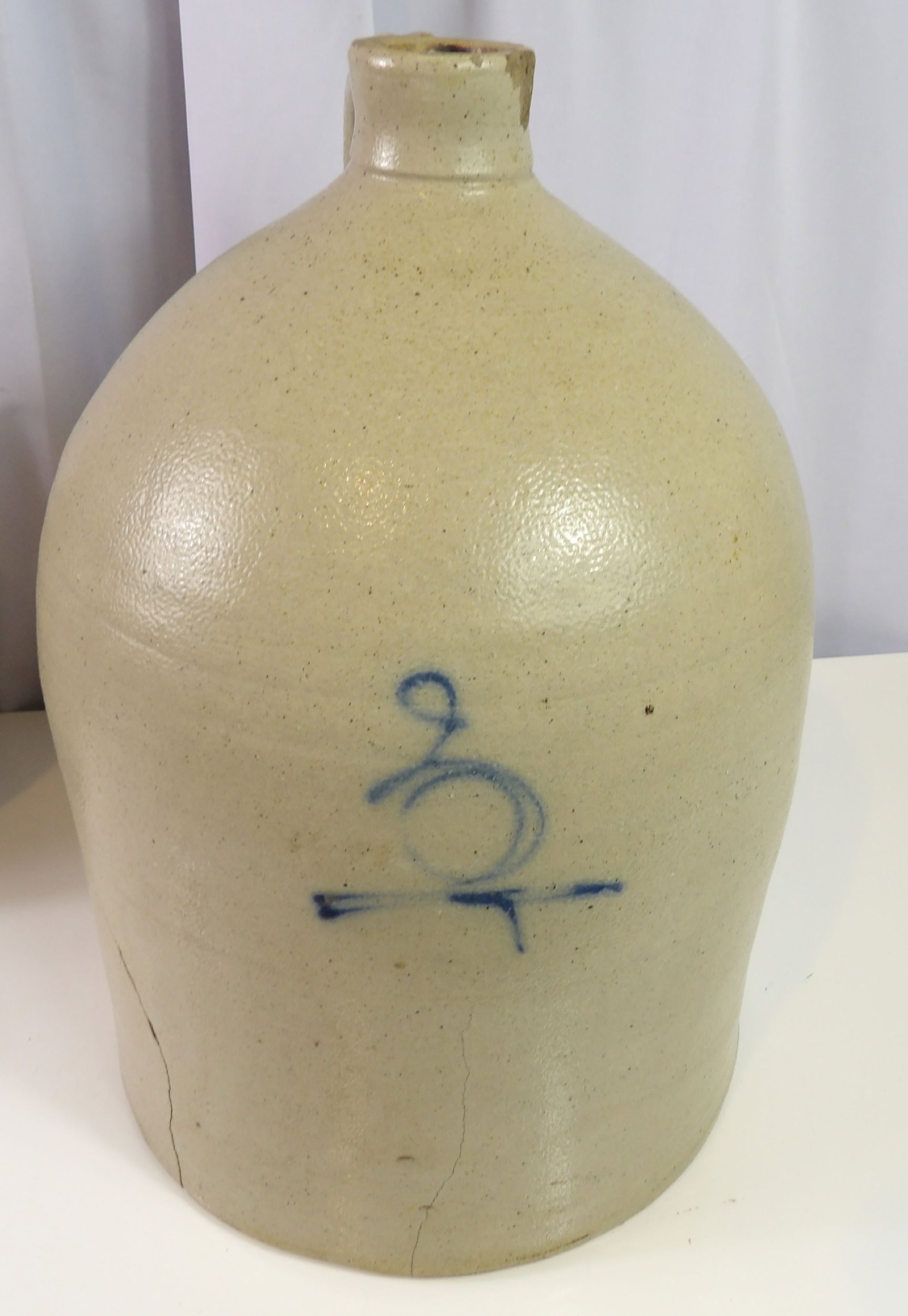 Stoneware Jug with Cobalt Decoration: Antique Stoneware Jug with Cobalt Decoration. (Has couple of cracks) Overall good shape. All measurements approximate. Please see photos for condition and details. Selling as is from 04281.