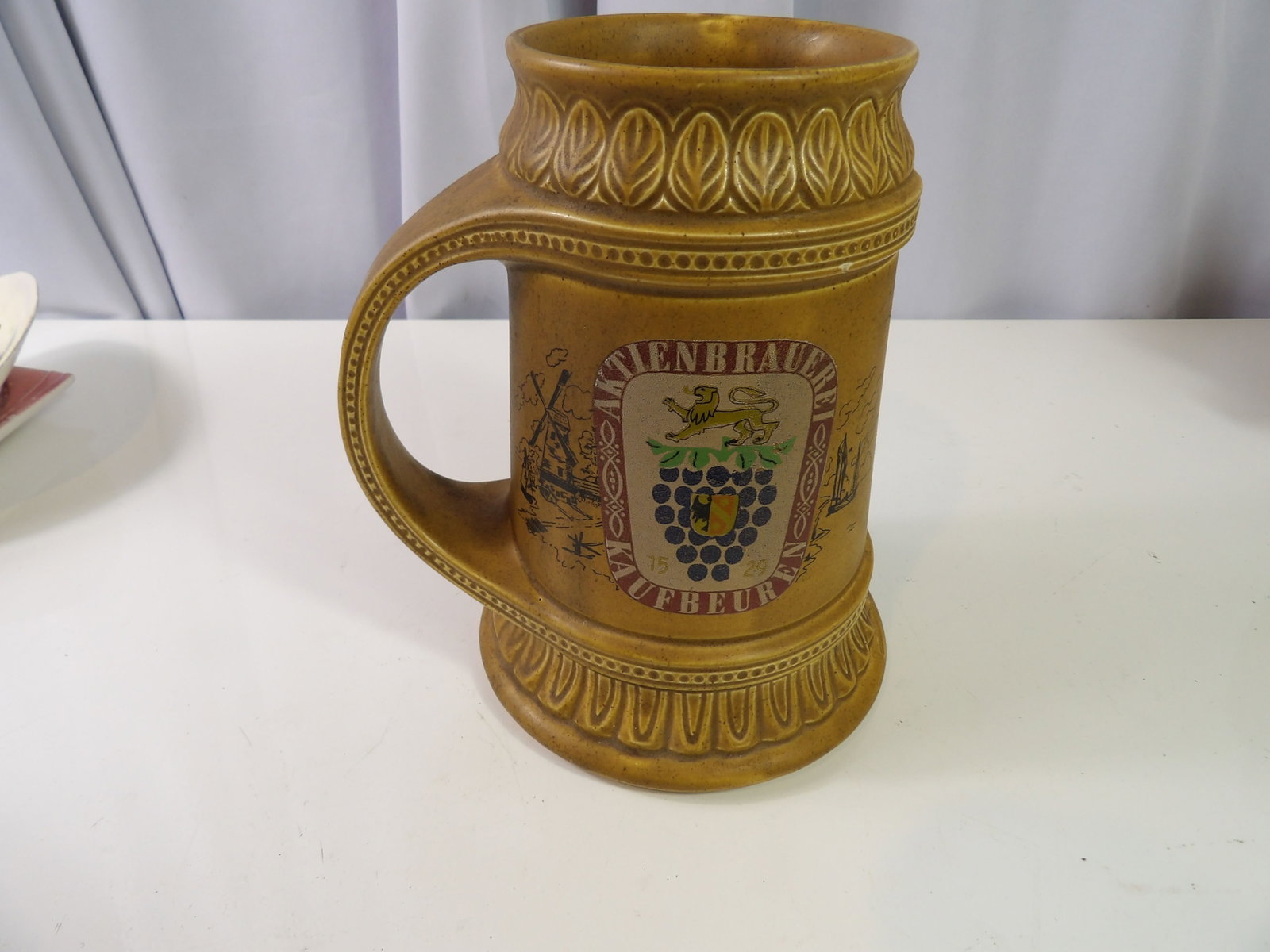 Vintage German Stoneware Beer Stein: Vintage German Stoneware Beer Stein. All measurements approximate. Please see photos for condition and details. Selling as is from 04281.
