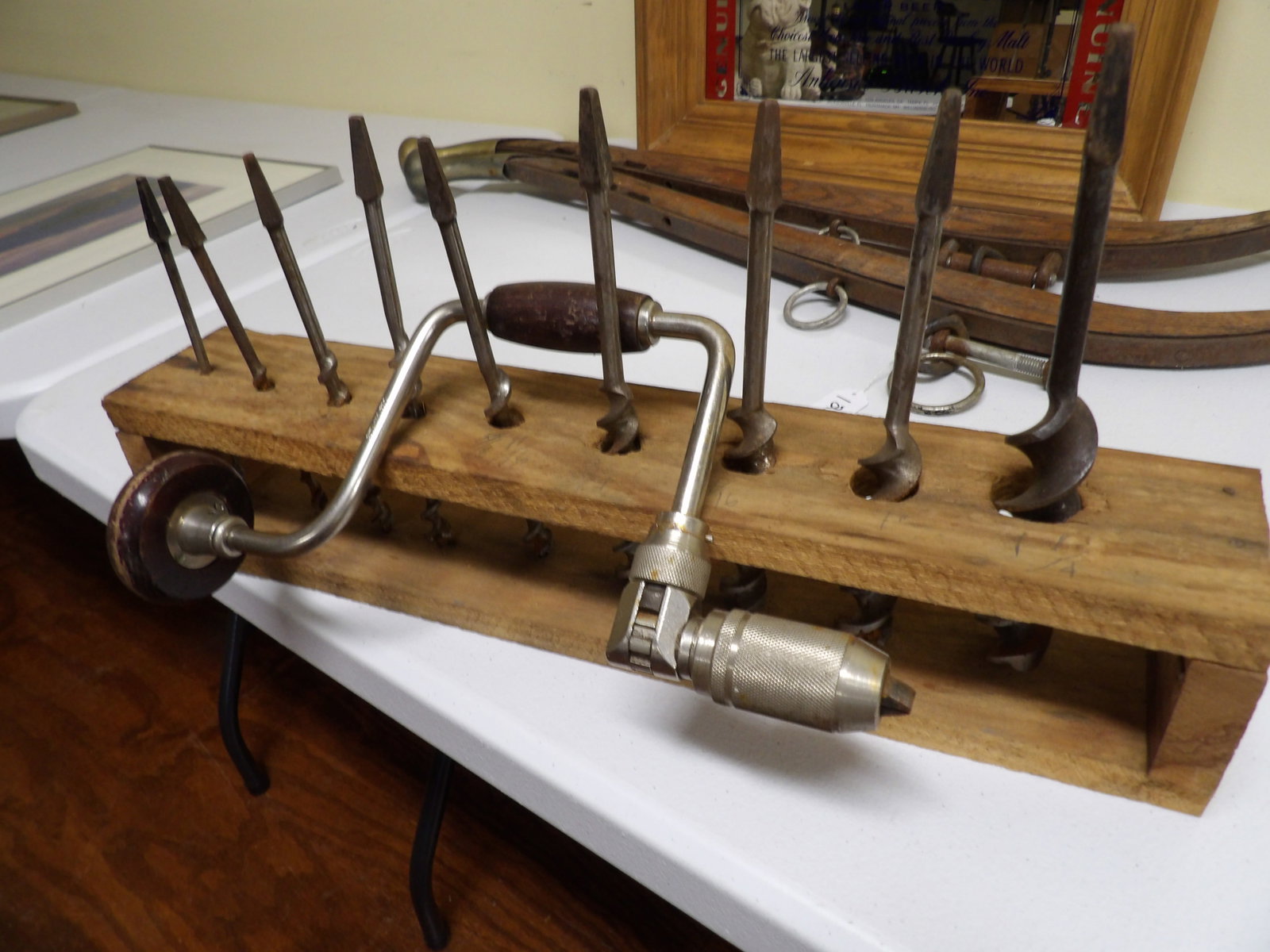 Antique Hand Drill with Wooden Stand: Antique Hand Drill Bit Brace Auger Set with Wooden Stand. All measurements approximate. Please see photos for condition and details. Selling as is from 04281.