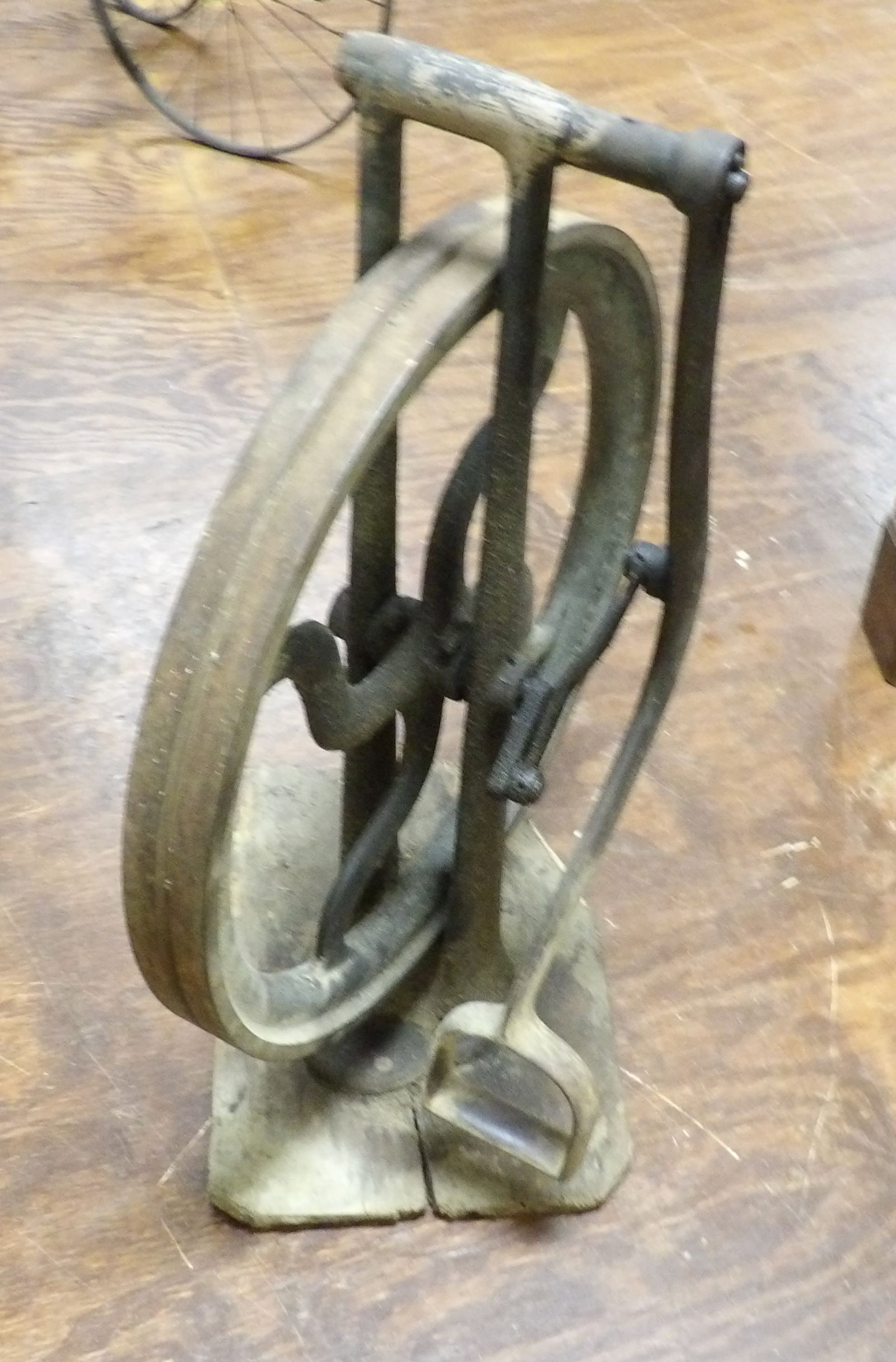 Cast Iron Flywheel Foot Pedal Mechanism: Antique Cast Iron Flywheel Foot Pedal Mechanism, Works Nicely. All measurements approximate. Please see photos for condition and details. Selling as is from 04281.