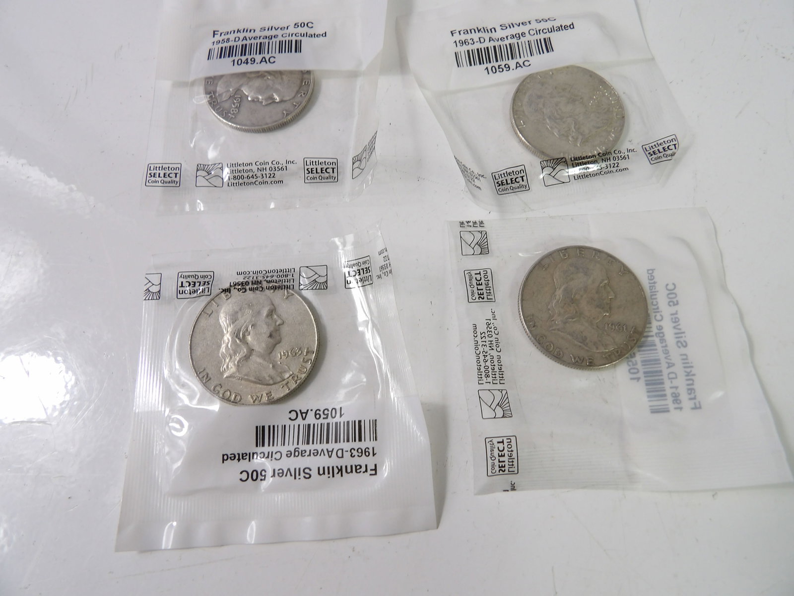 4 PCS.-Franklin Half-Dollars: Lot of 4, Average Circulated, Franklin Half-Dollars. All measurements approximate. Please see photos for condition and details. Selling as is from 04281.