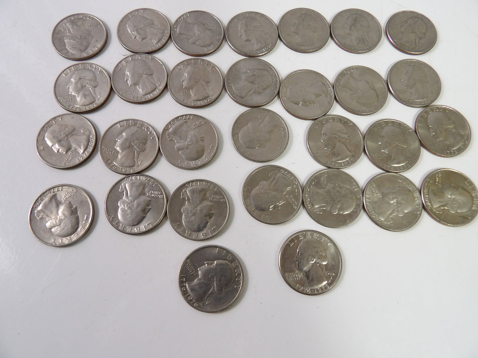 30 PCS.-Bicentennial Quarters: Lot of 30 Bicentennial Quarters. All measurements approximate. Please see photos for condition and details. Selling as is from 04281.
