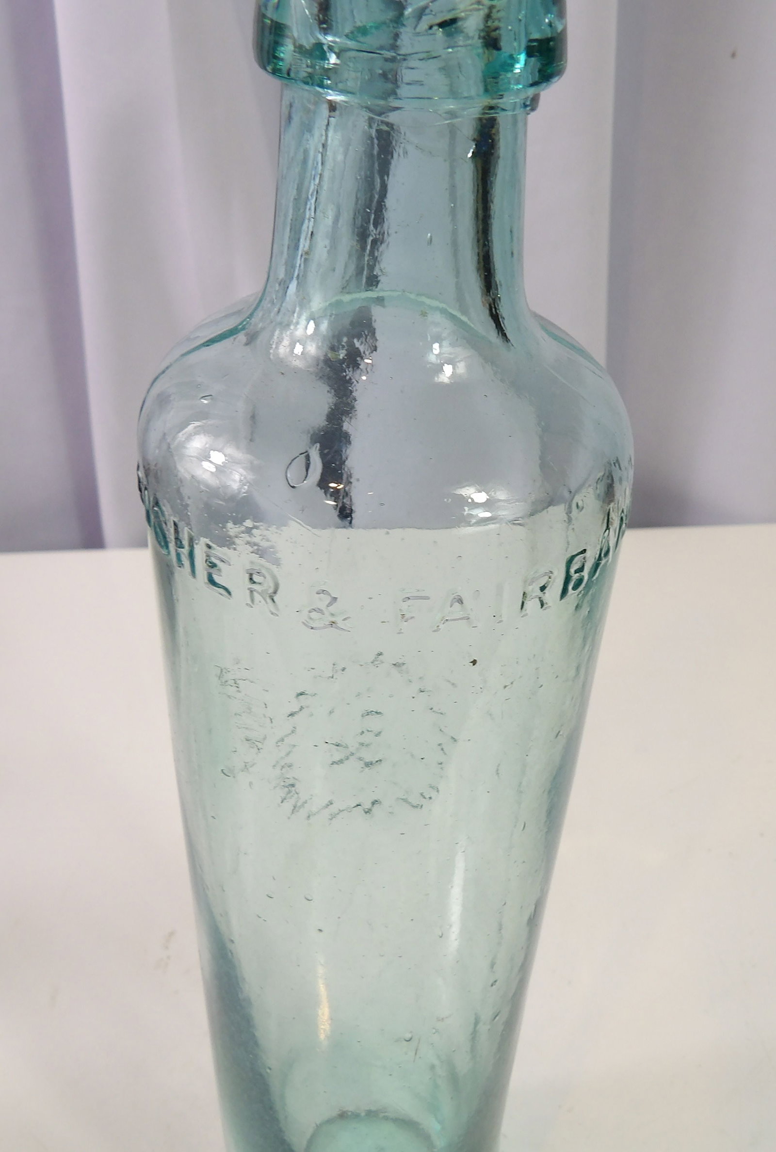 Fisher & Fairbanks Blob Top Bottle: Rare Fisher & Fairbanks Blob Top Bottle, 13" Tall. All measurements approximate. Please see photos for condition and details. Selling as is from 04281.