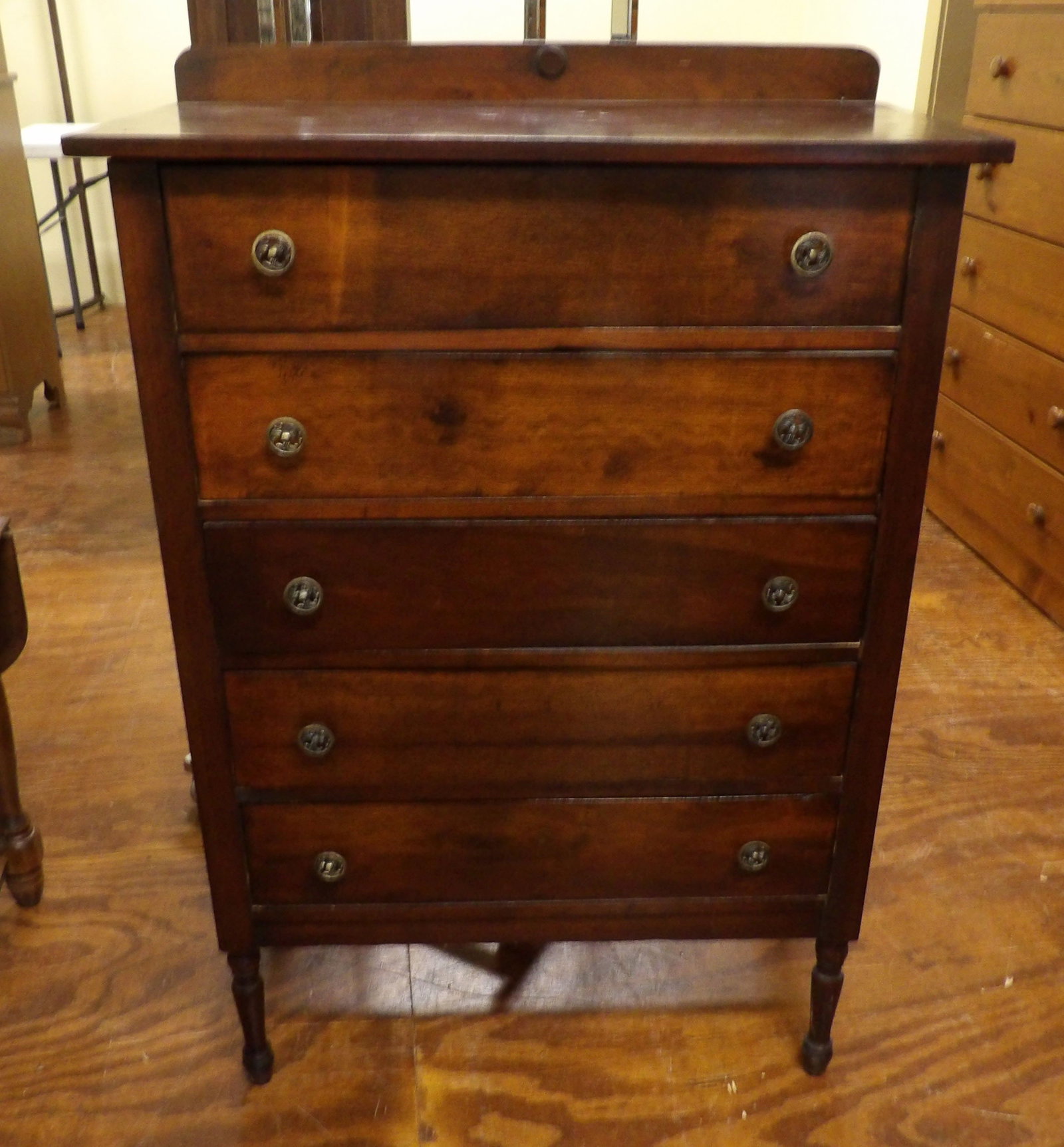 Vintage Wooden Dresser: Vintage Dark Stained Wooden Dresser with 5 Drawers and Turned Legs. All measurements approximate. Please see photos for condition and details. Selling as is from 04281.