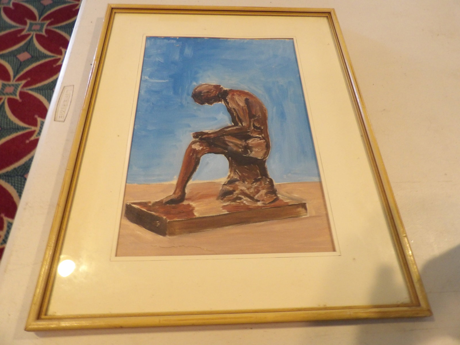Framed Rodin's "The Thinker": Framed Rodin's "The Thinker" Sculpture against a Blue Sky, 16" X 21". All measurements approximate. Please see photos for condition and details. Selling as is from 04281.