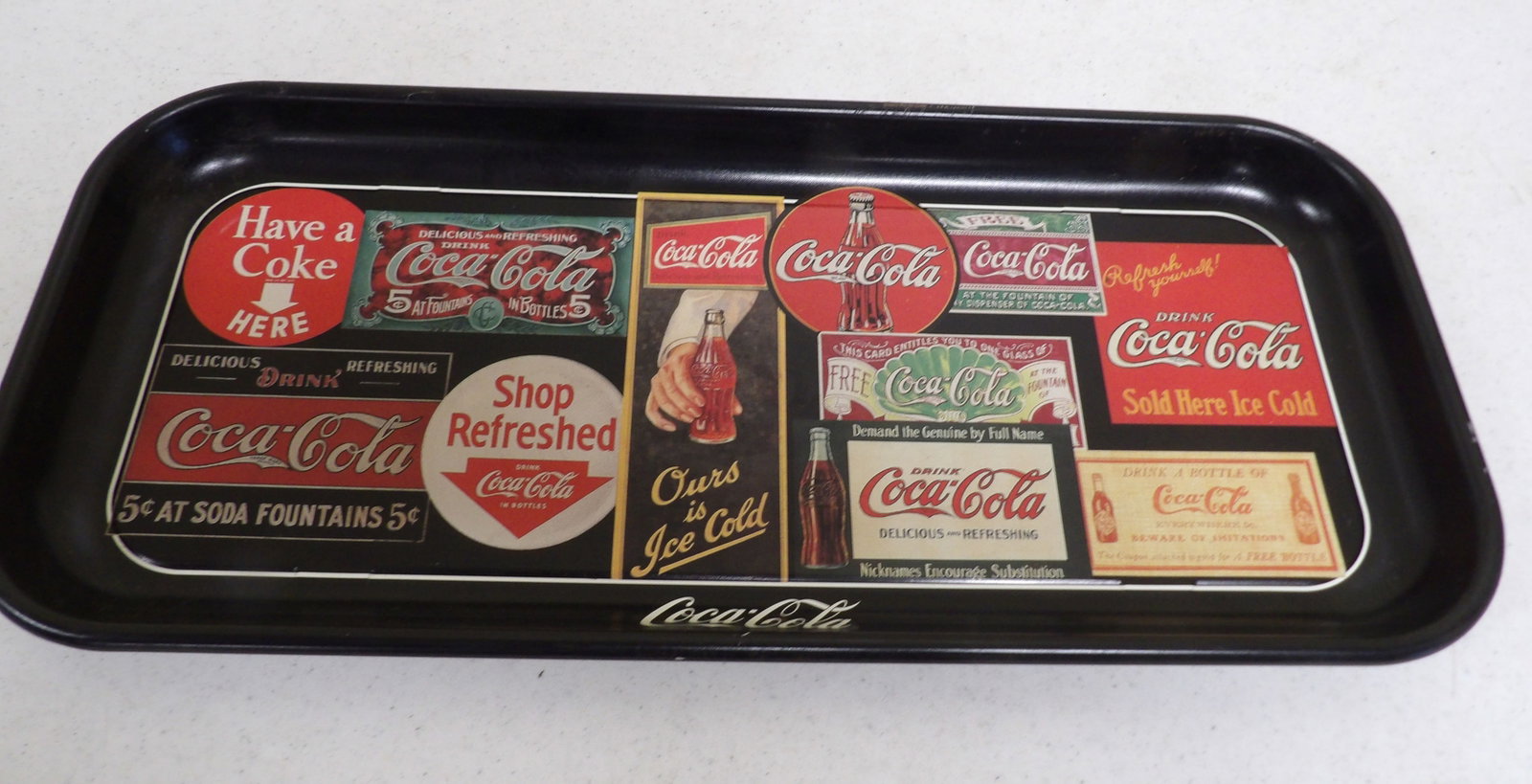 Coca Cola Advertising Tray: 8 1/2" X 19" Coca Cola Advertising Tray. All measurements approximate. Please see photos for condition and details. Selling as is from 04281.