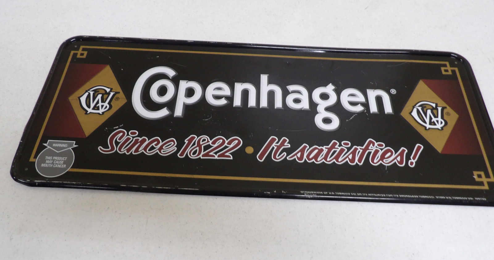 Vintage Copenhagen Sniff Metal Sign: Vintage Copenhagen Sniff Metal Sign, 9" X 24". All measurements approximate. Please see photos for condition and details. Selling as is from 04281.