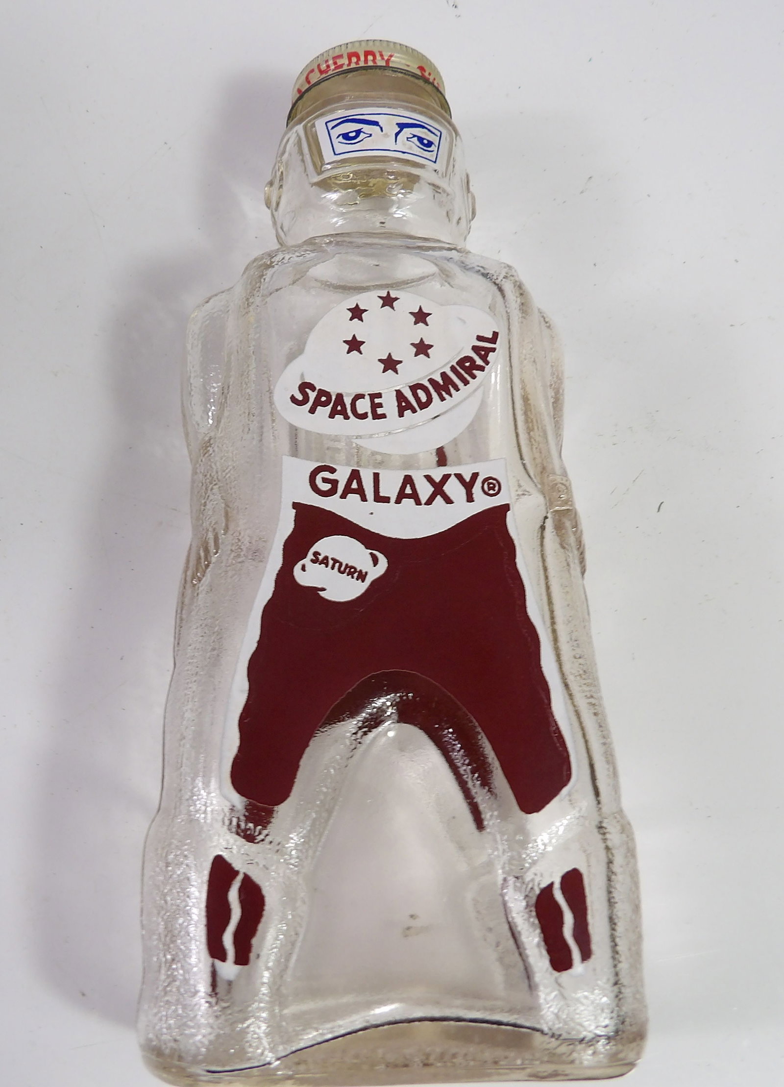 Vintage Galaxy Space Admiral Spaceman Glass Syrup Bottle: Vintage Galaxy Space Admiral Spaceman Glass Syrup Bottle. All measurements approximate. Please see photos for condition and details. Selling as is from 04281.