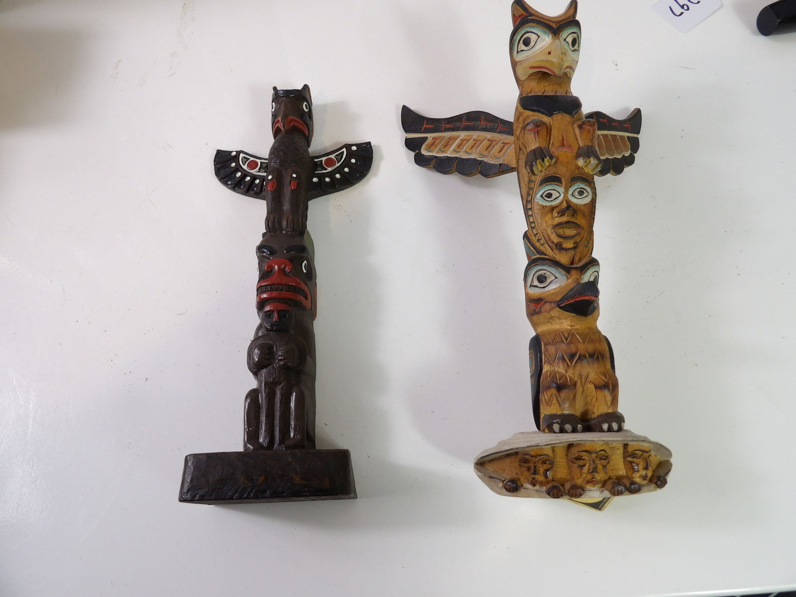 Pair of Hand Carved Totem Poles (1 of 4)