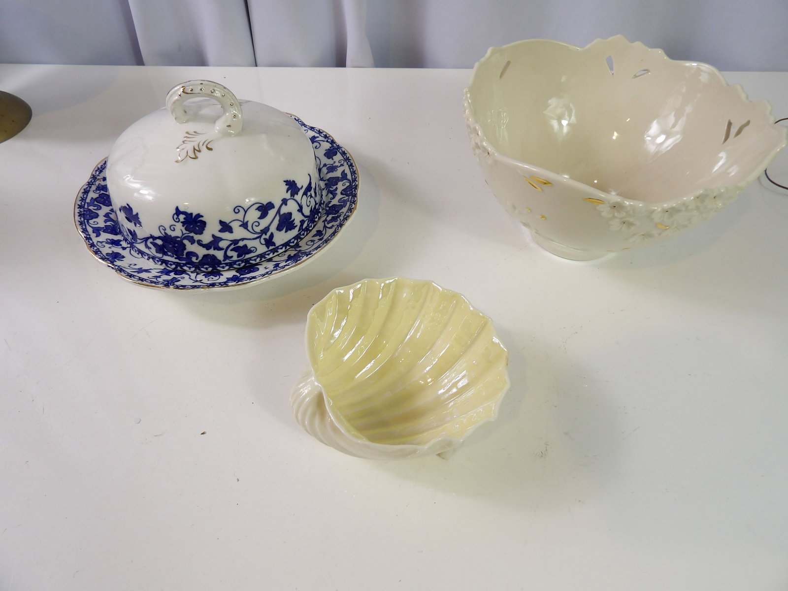 Butter Dish, Cream Bowl and Shell Dish: Ceramic Butter Dish with Blue Floral Pattern, Cream Bowl and Shell Dish. John Hadock, Belleek, and Lenox. All measurements approximate. Please see photos for condition and details. Selling as is from