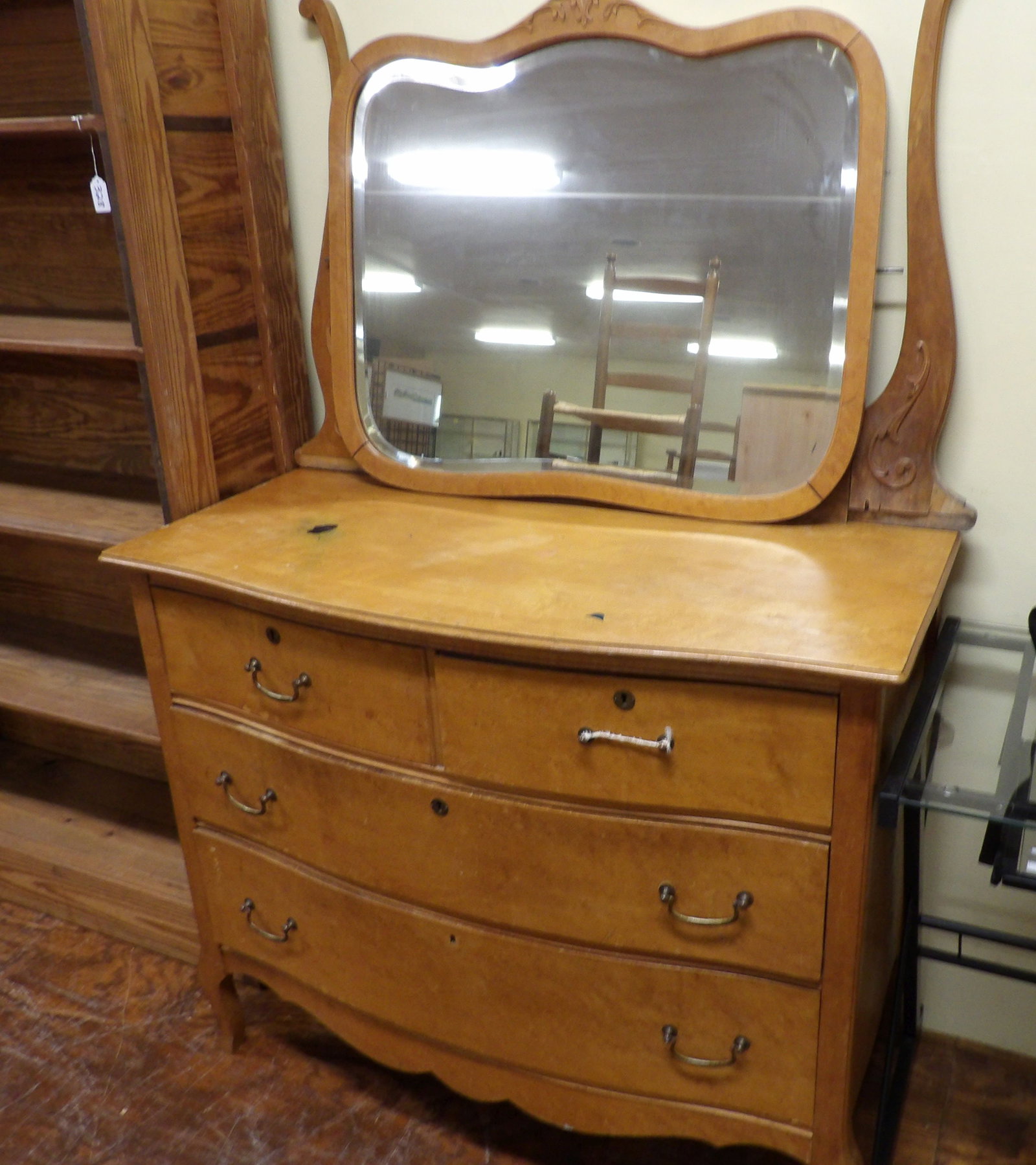 Antique Maple Dresser with Mirror: Antique Birdseye Maple Dresser with Ornate Beveled Mirror. All measurements approximate. Please see photos for condition and details. Selling as is from 04281.