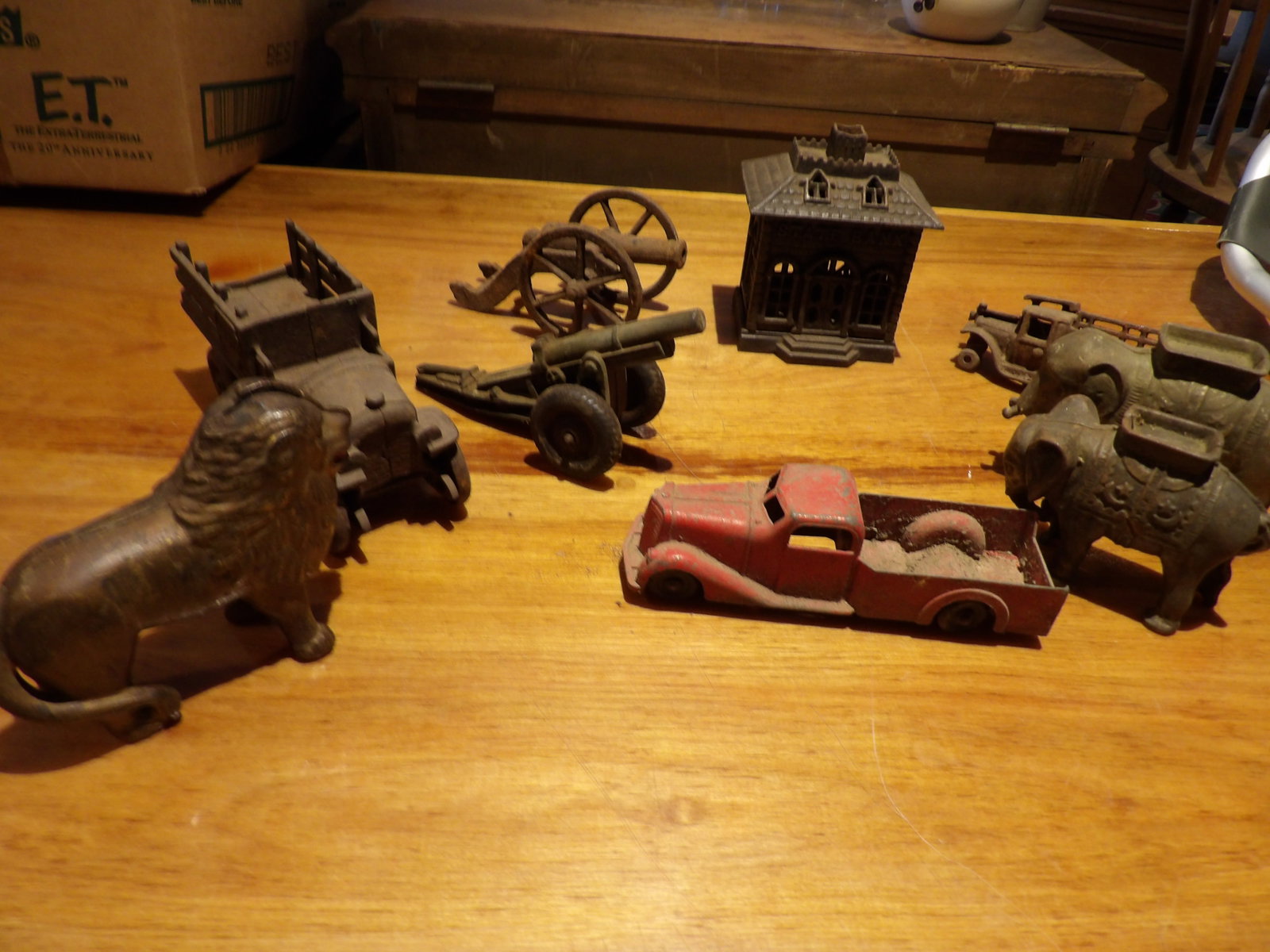 Large Lot of Cast Iron Toys and Banks: Large Lot of Early Cast Iron Toys and Banks. All measurements approximate. Please see photos for condition and details. Selling as is from 04281.